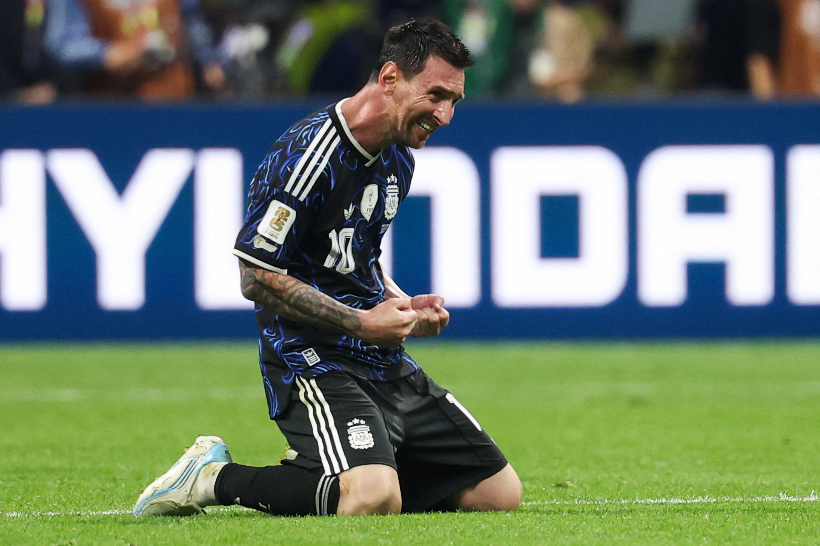 Argentina captain Lionel Messi celebrates after the win over England sent him to his second World Cup final in a row on July 15, 2026 [Odd Andersen/AFP]