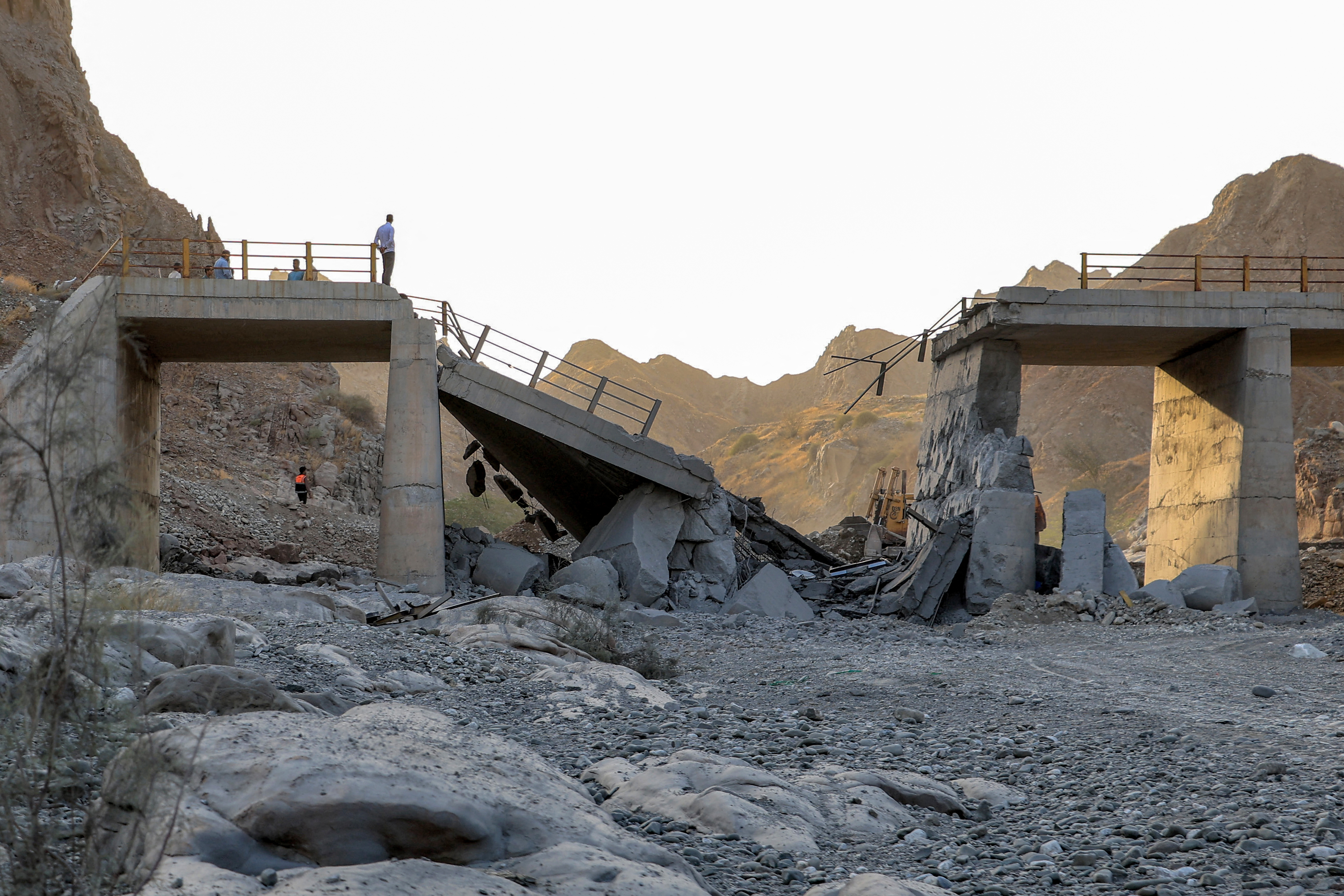 A heavily-damaged bridge which was hit by a US strike is pictured along the road connecting Roudan and Bandar Abbas in southern Iran