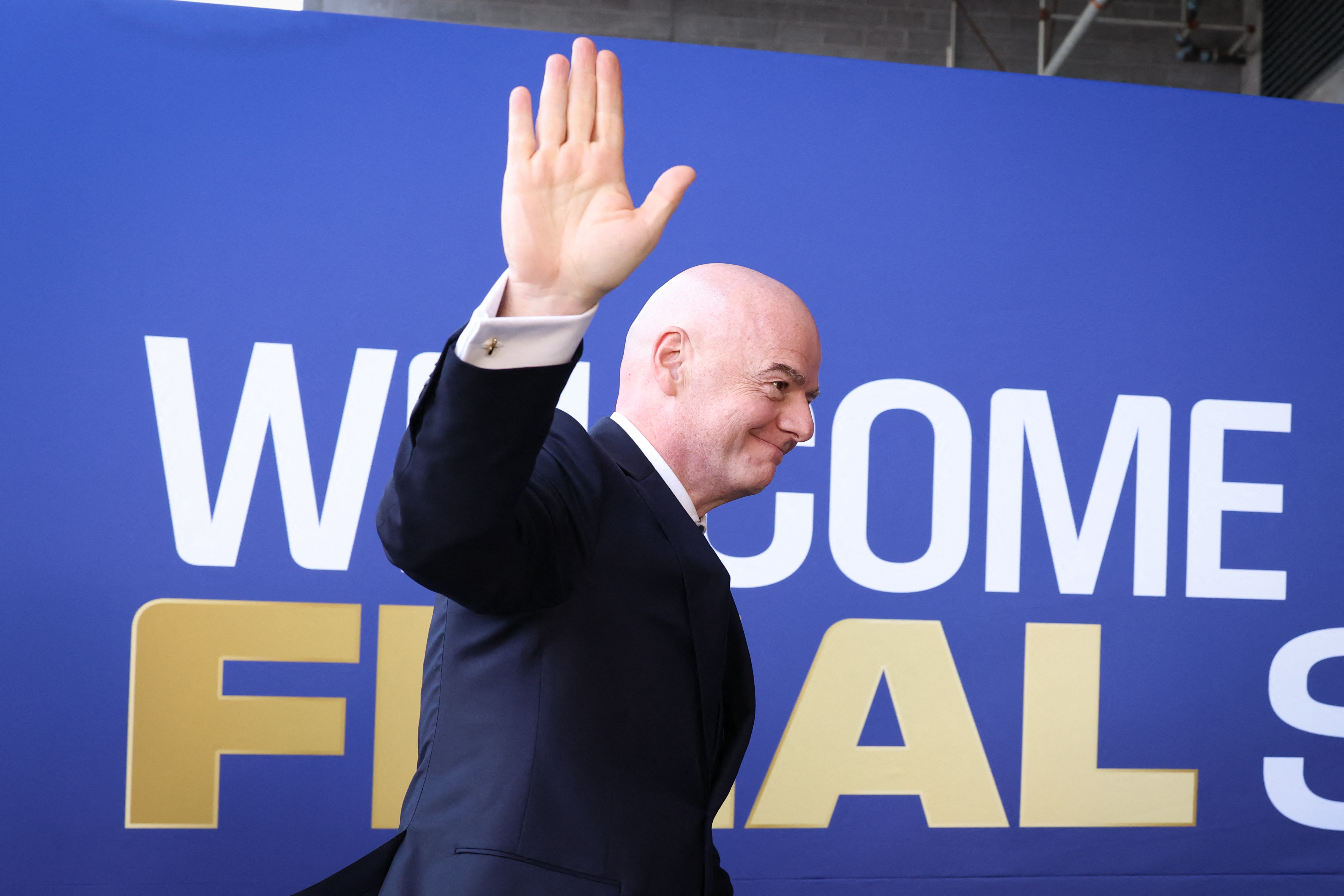 FIFA President Gianni Infantino waves as he arrives for the 2026 World Cup football tournament final match between Spain and Argentina at the New York/New Jersey Stadium in East Rutherford on July 19, 2026. (Photo by CHARLY TRIBALLEAU / AFP)