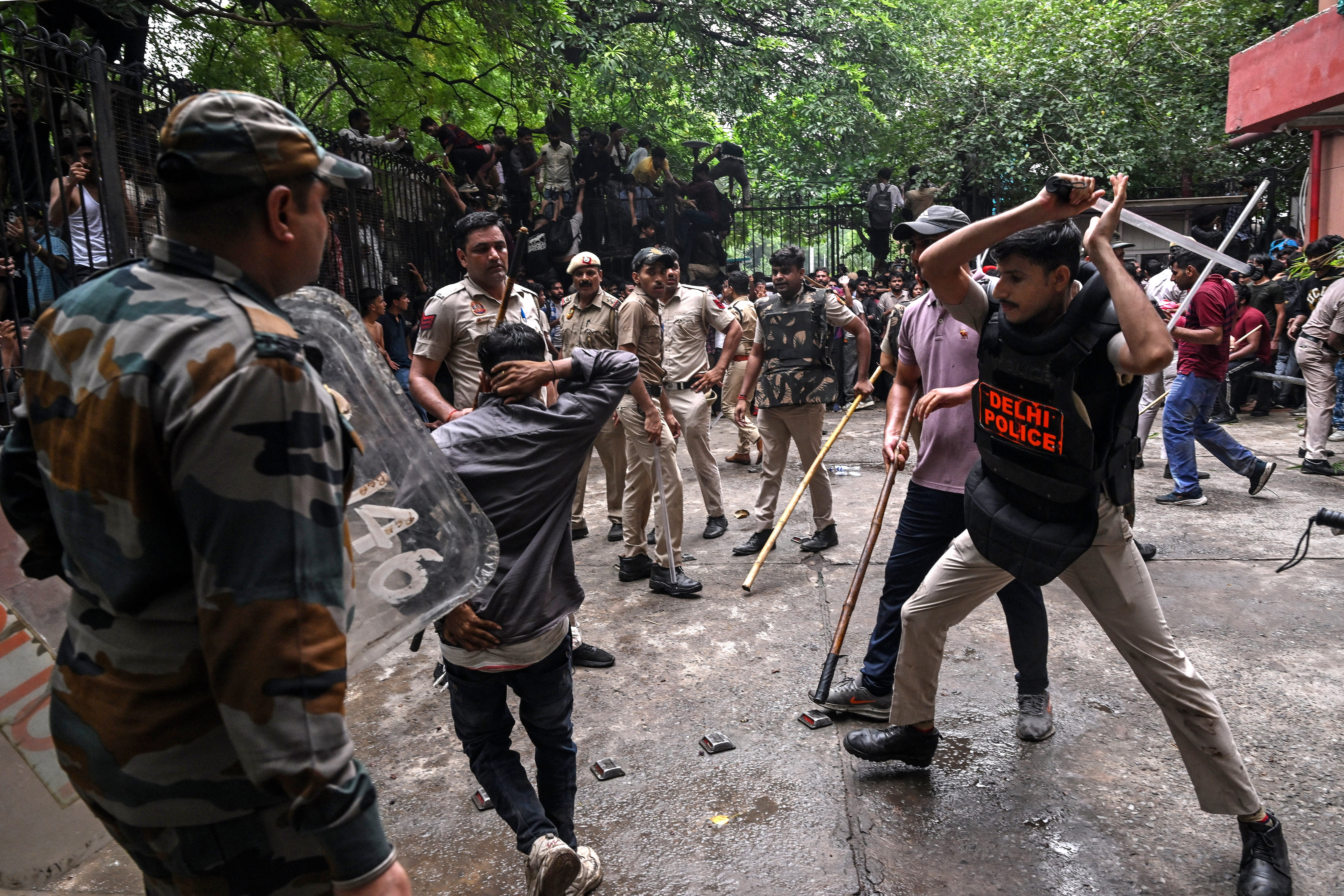 Police fire tear gas at India's Cockroach movement supporters