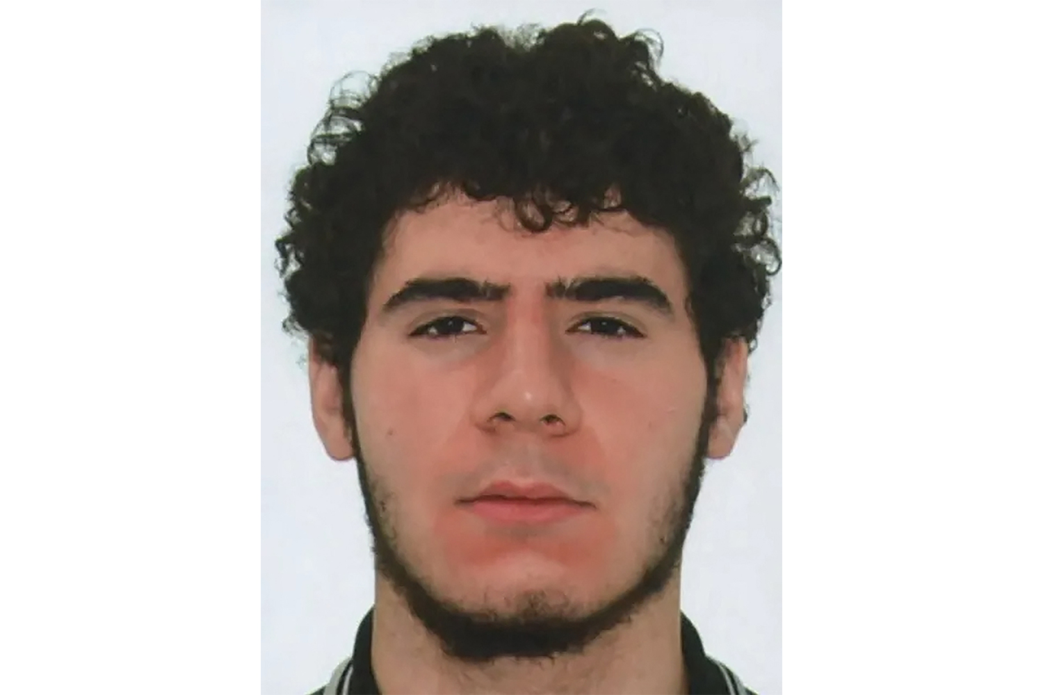This undated handout image released by Polizei Berlin on July 26, 2026 shows a 21-year old suspect identified by police as Abdul B. in a public appeal for his arrest, after a car ploughed into a crowd near Berlin's Gay Pride celebrations killing one person and wounding 16 others. Berlin police described the suspect as slender, about 1.90 metres (6 feet 3 inches) tall, with black hair, wearing a black hoodie and white trousers. (Photo by Handout / POLIZEI BERLIN / AFP) / RESTRICTED TO EDITORIAL USE - MANDATORY CREDIT "AFP PHOTO / POLIZEI BERLIN" - HANDOUT - NO MARKETING NO ADVERTISING CAMPAIGNS - DISTRIBUTED AS A SERVICE TO CLIENTS