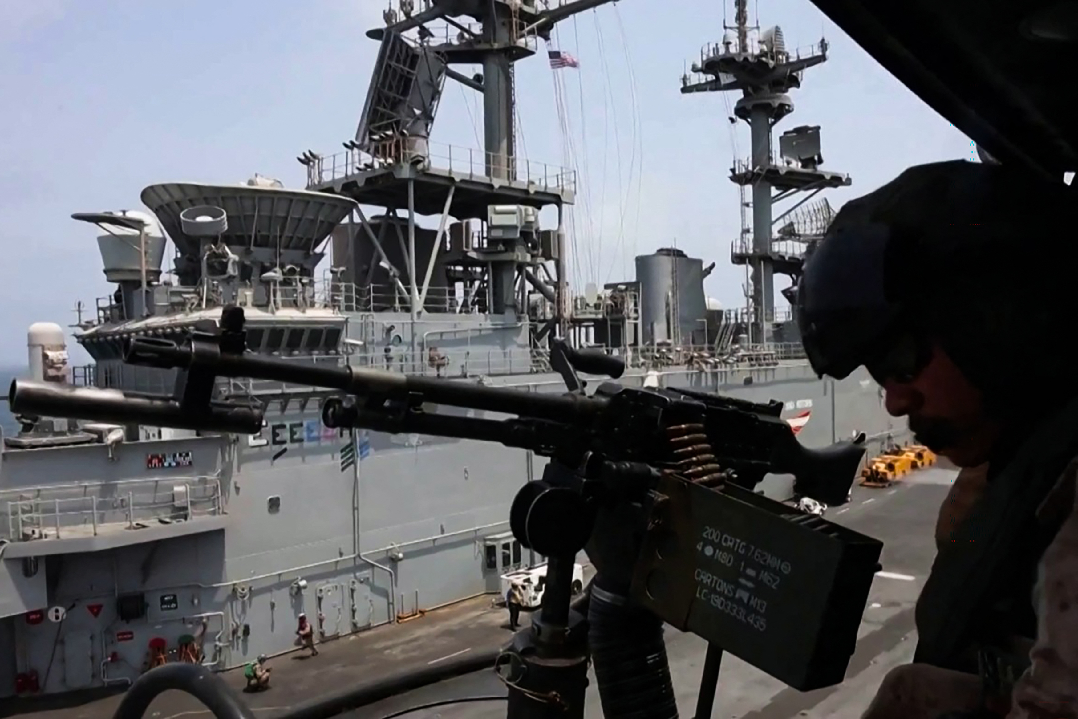 This screen grab made on July 26, 2026 from undated handout video footage released by the US Central Command (CENTCOM) on July 25, 2026 shows what CENTCOM says are operations enforcing its naval blockade against Iran. Iran passed another night without US airstrikes on July 26, as Washington paused a war nearing its fifth month and reports emerged that concerns over dwindling munitions were restraining plans for further escalation. (Photo by US Central Command (CENTCOM) / AFP) / --- RESTRICTED TO EDITORIAL USE - MANDATORY CREDIT "AFP PHOTO / US CENTRAL COMMAND (CENTCOM)" - HANDOUT - NO MARKETING NO ADVERTISING CAMPAIGNS - DISTRIBUTED AS A SERVICE TO CLIENTS