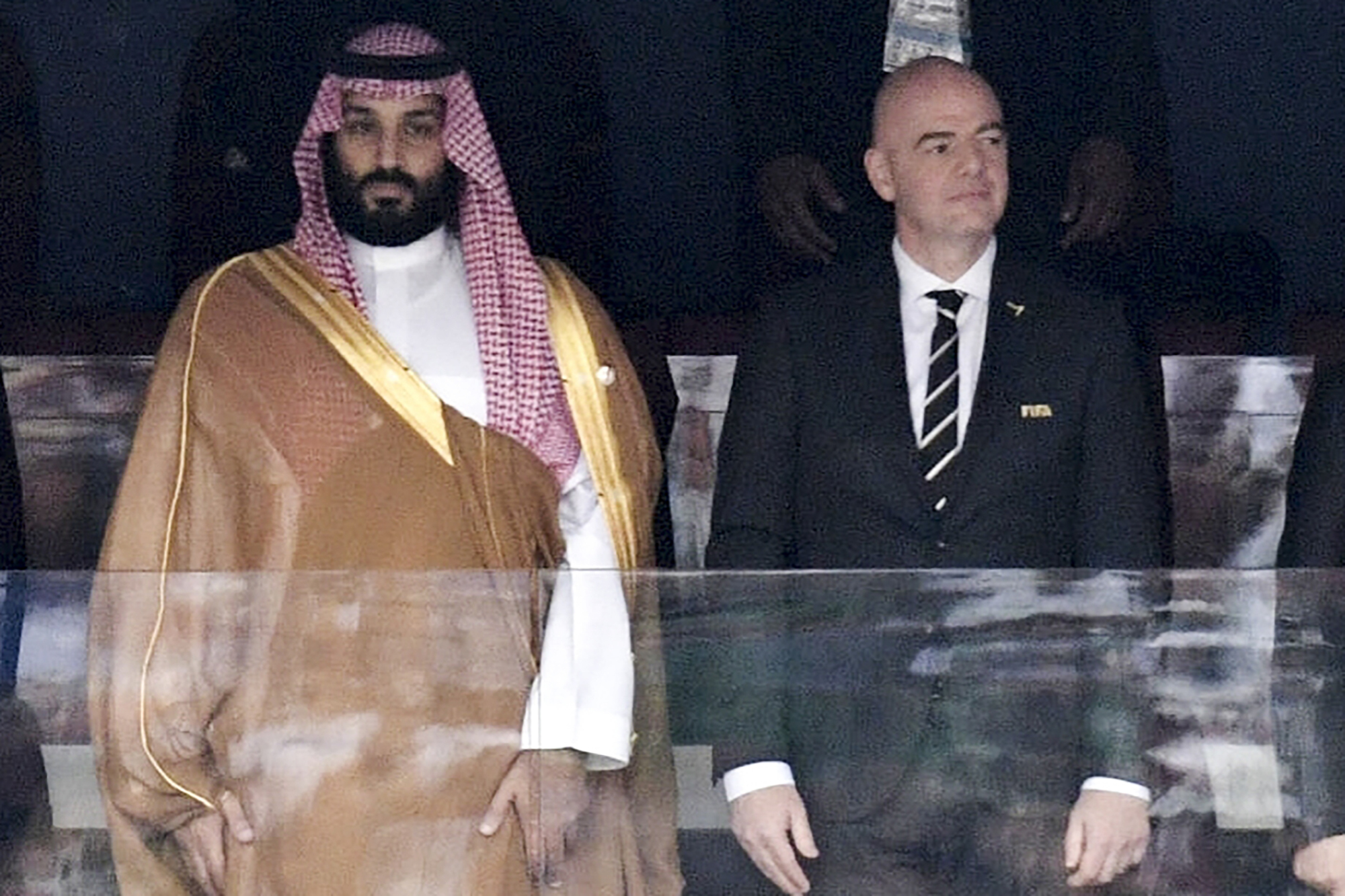 Saudi Arabia Crown Prince Mohammed bin Salman, left, and FIFA President Gianni Infantino stand for the anthem before the match between Russia and Saudi Arabia, which opened the 2018 World Cup