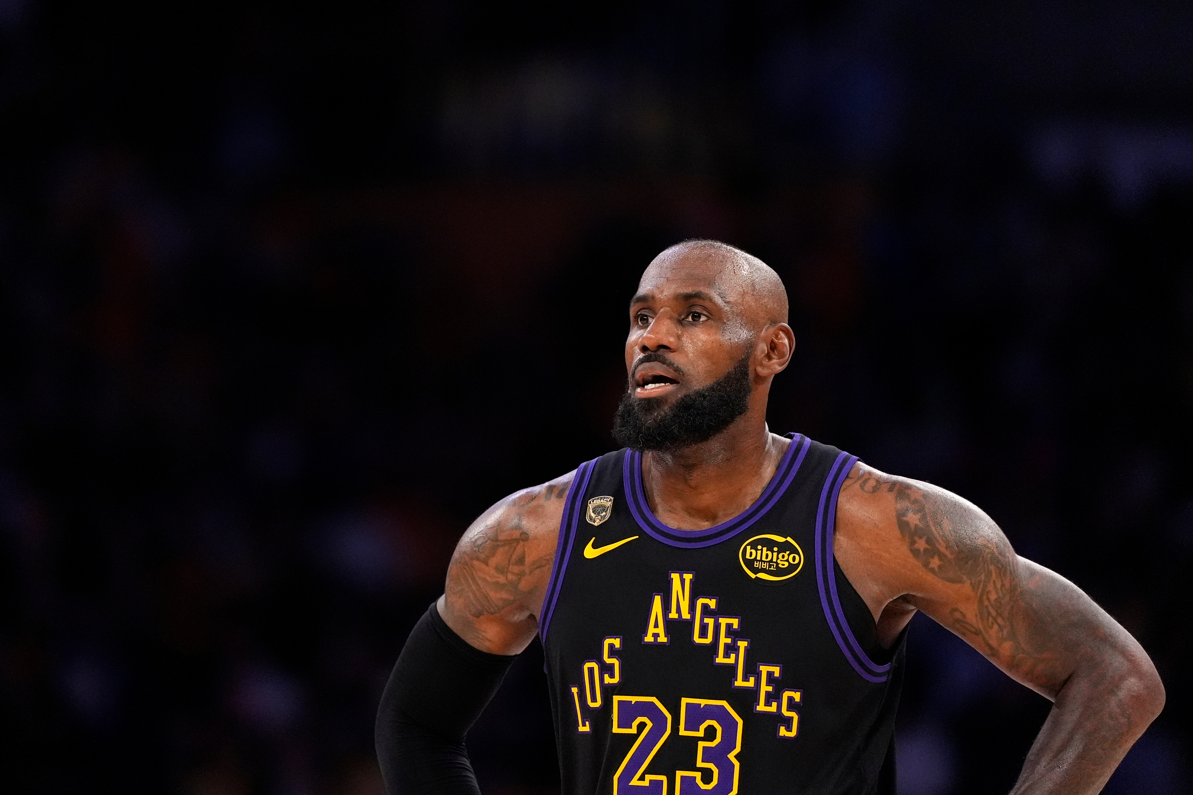 Los Angeles Lakers forward LeBron James stands on the court in the closing minutes of Game 4 in a second-round NBA basketball playoffs series against the Oklahoma City Thunder, Monday, May 11, 2026, in Los Angeles. (AP Photo/Mark J. Terrill)
