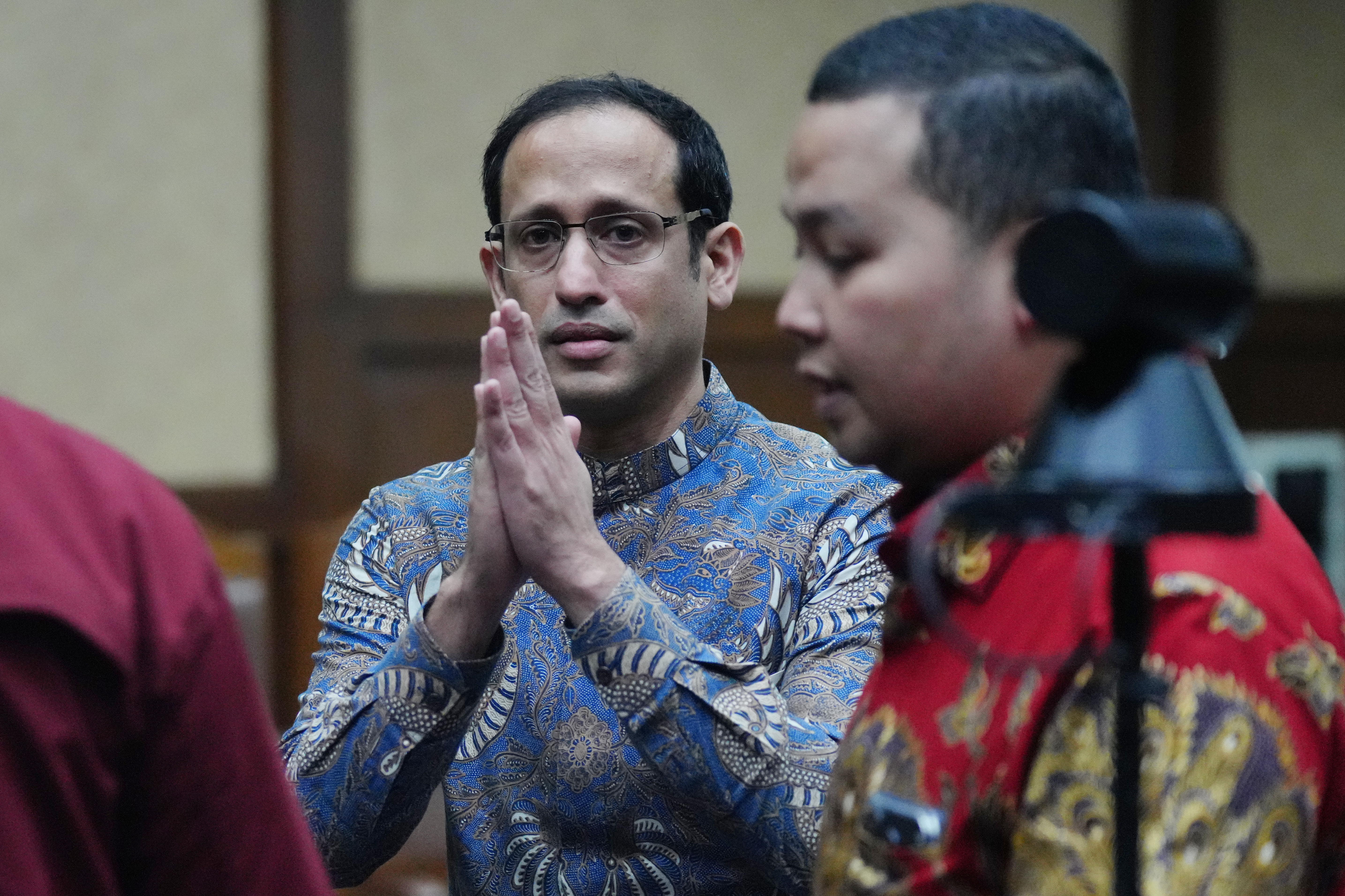 Nadiem Makarim gestures after being sentenced in a laptop procurement corruption case at the Indonesian Court for Corruption Crimes in Jakarta, on June 30, 2026