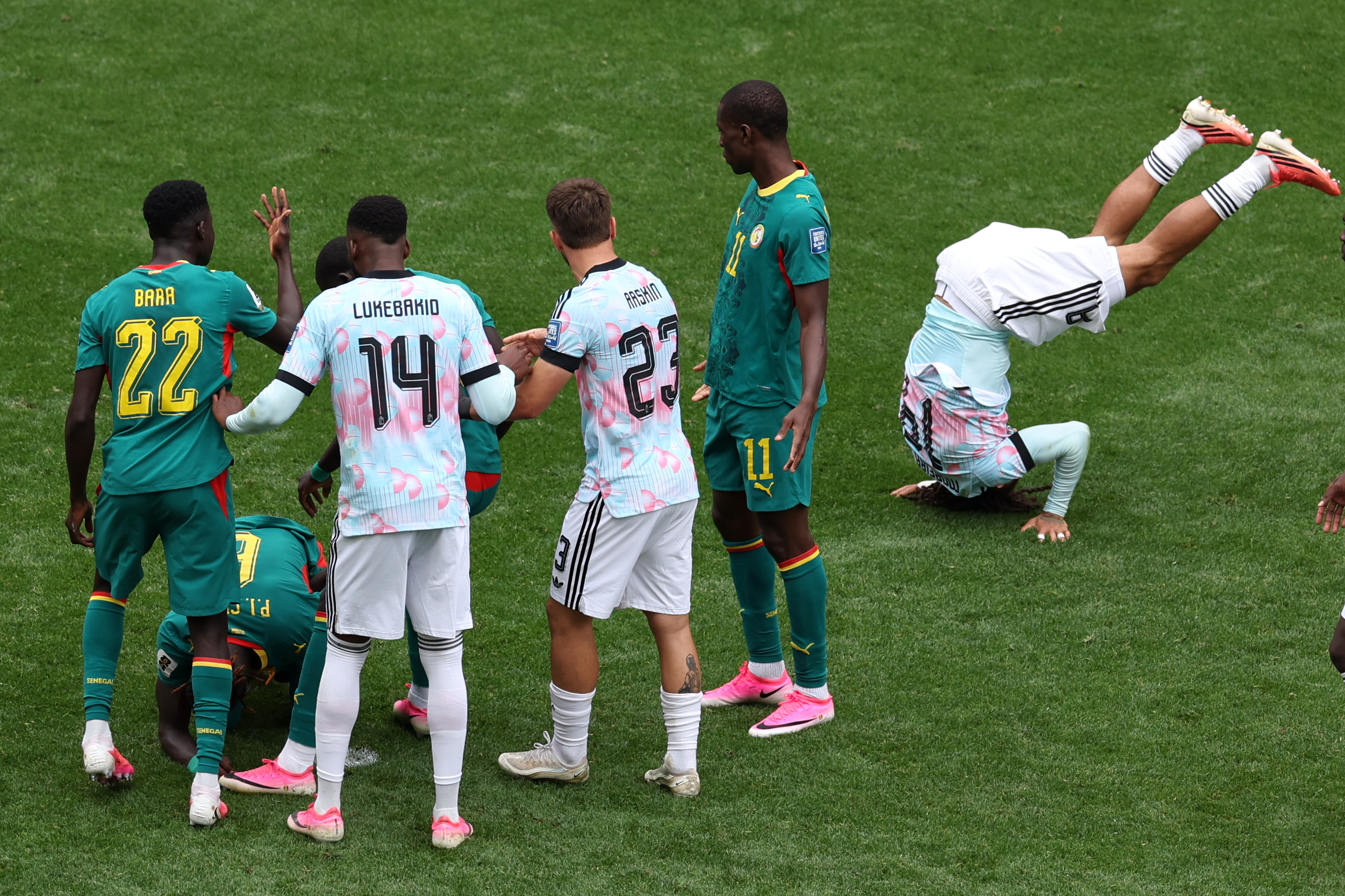 Senegal’s Pathe Ciss #6 kneels on the pitch after Belgium were awarded a penalty during the World Cup Round of 32 match in Seattle, on Wednesday, July 1, 2026