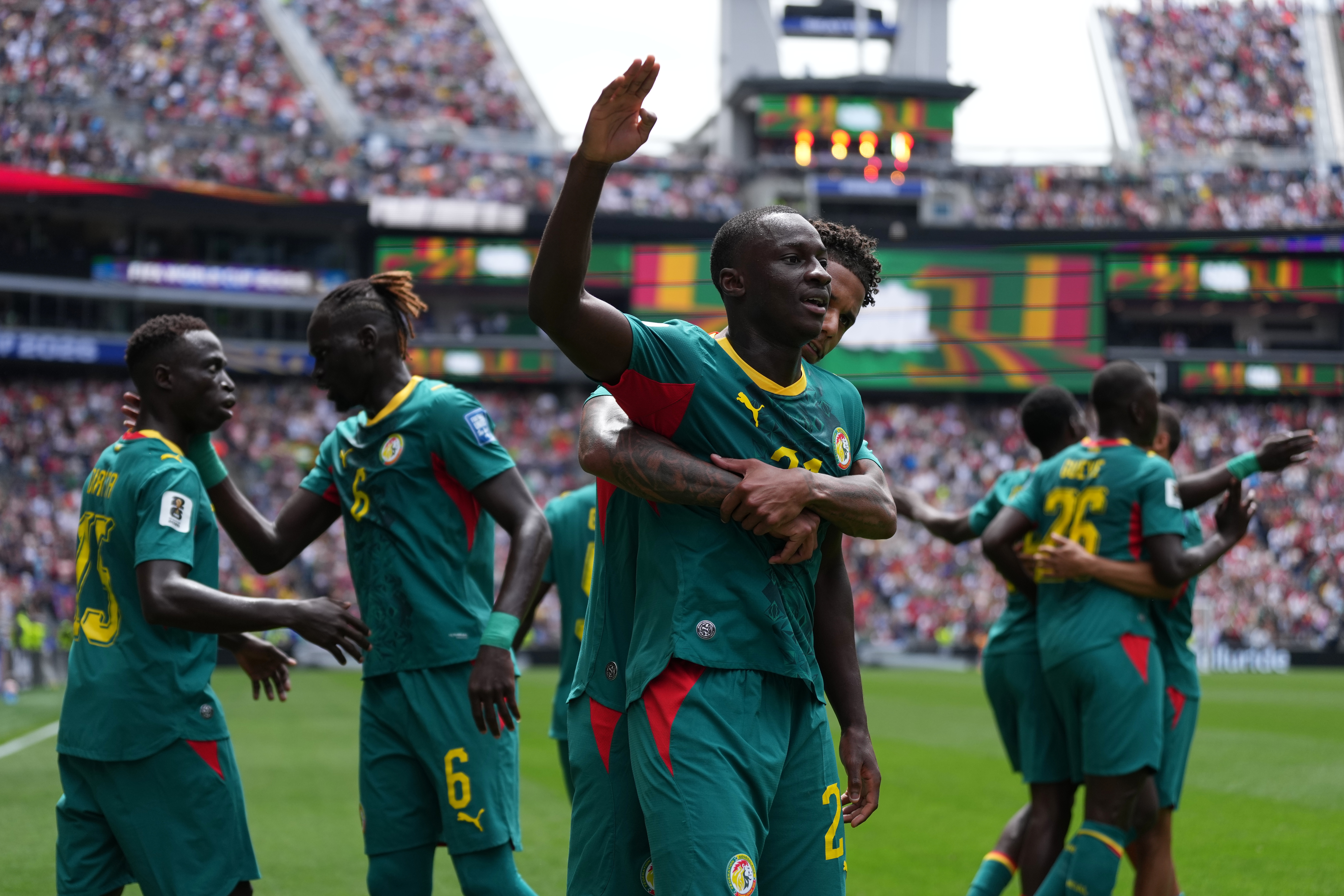 Senegal’s Habib Diarra, front, celebrates scoring their first goal with Ismail Jakobs, back, during the World Cup round of 32 soccer match between Belgium and Senegal in Seattle, Wednesday, July 1, 2026.