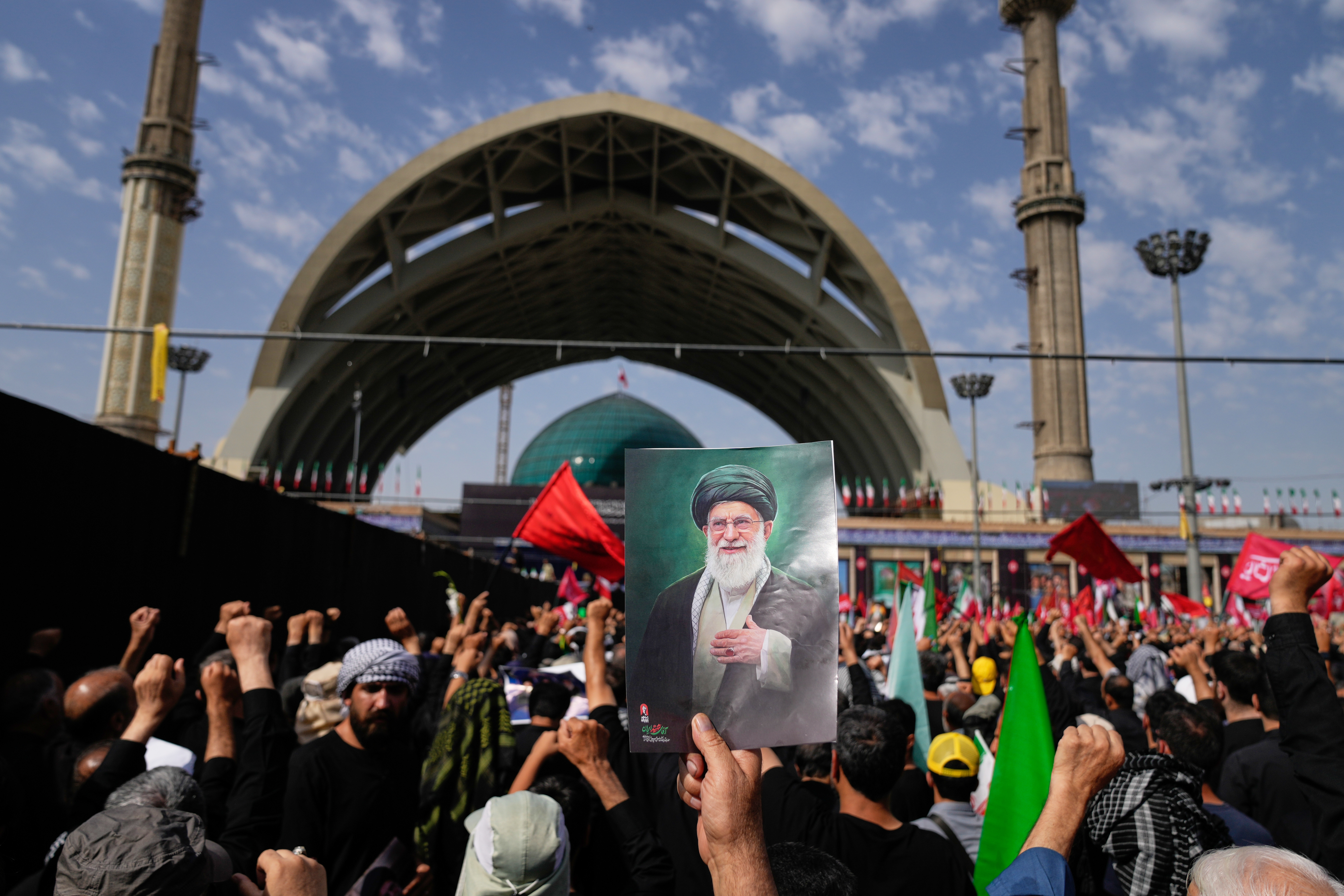 Millions mourn Khamenei in Tehran amid historic funeral procession.