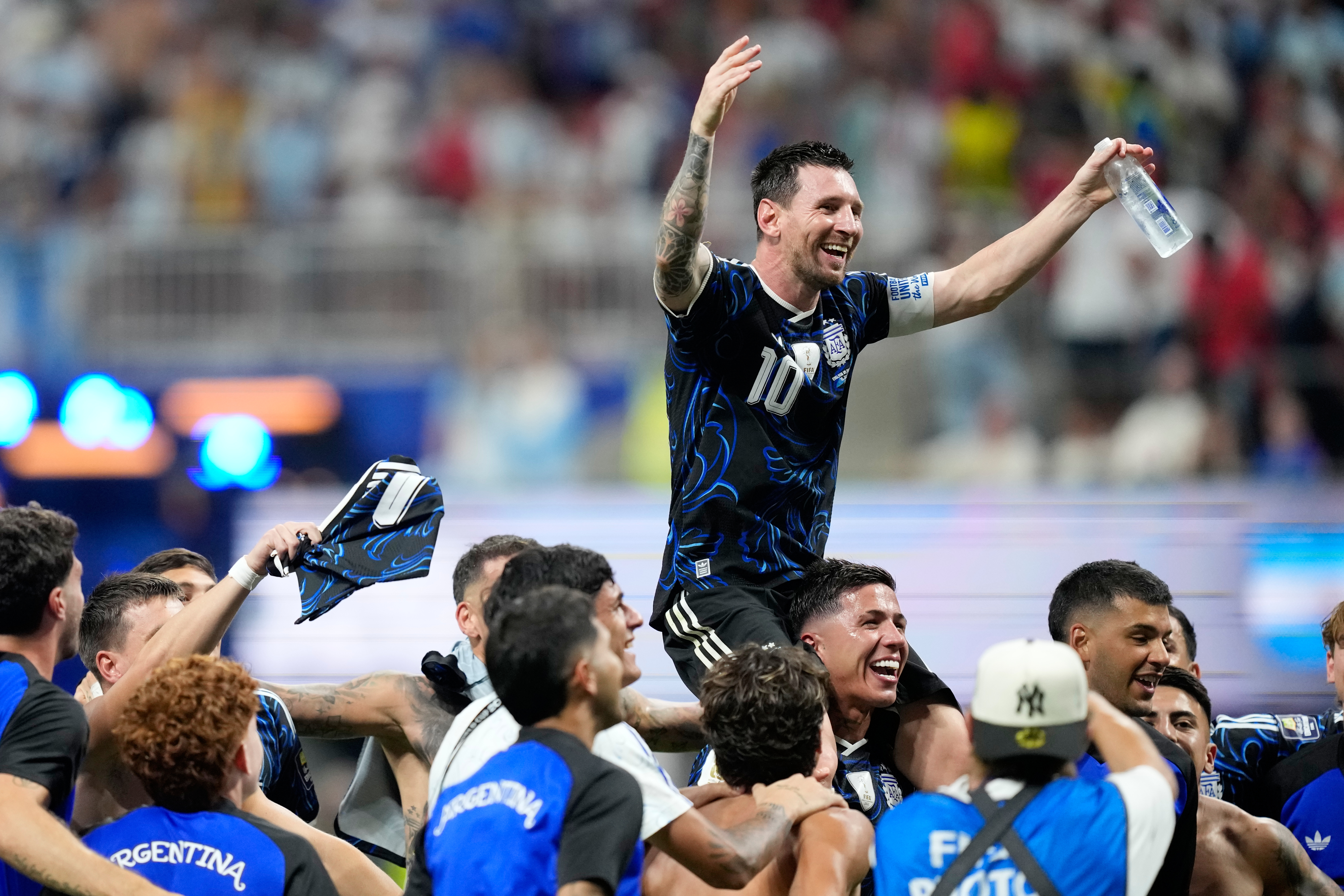 Argentina's Lionel Messi celebrates with his teammates at the end of the World Cup semifinal soccer match between England and Argentina in Atlanta, Wednesday, July 15, 2026. (AP Photo/Rebecca Blackwell)