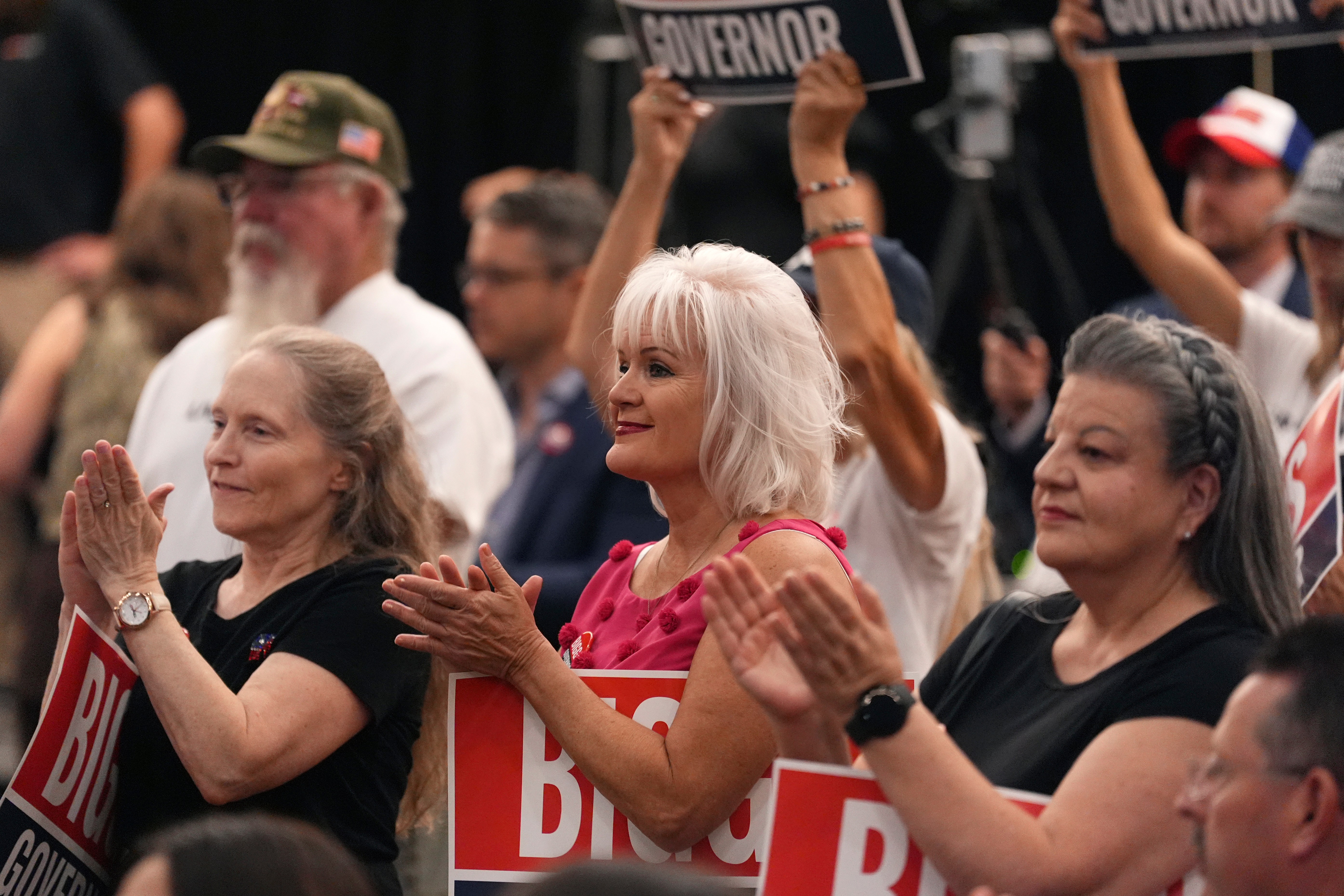 Supporters of Rep. Andy Biggs, R-Ariz., who is running in the primary for Arizona governor, cheer on Biggs at a campaign event, Friday, July 17, 2026, in Gilbert, Ariz
