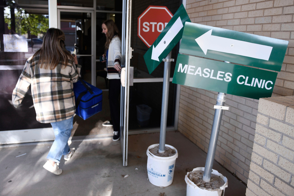 A person enters a measles clinic