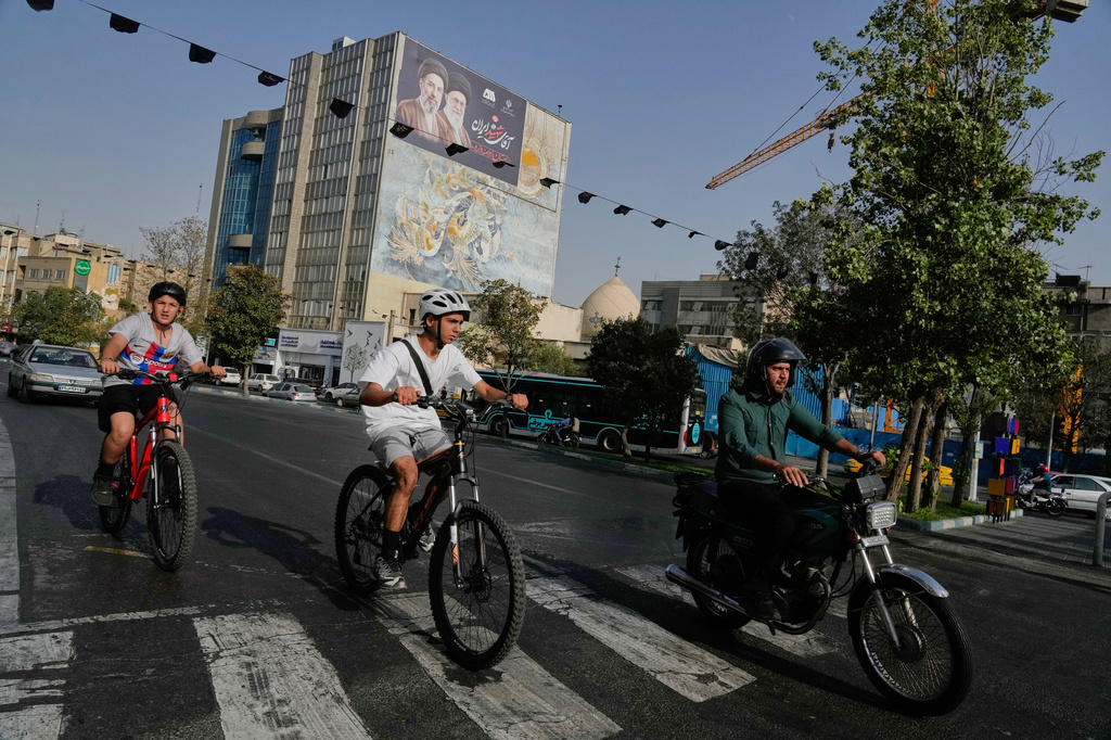 People on bikes in Iran