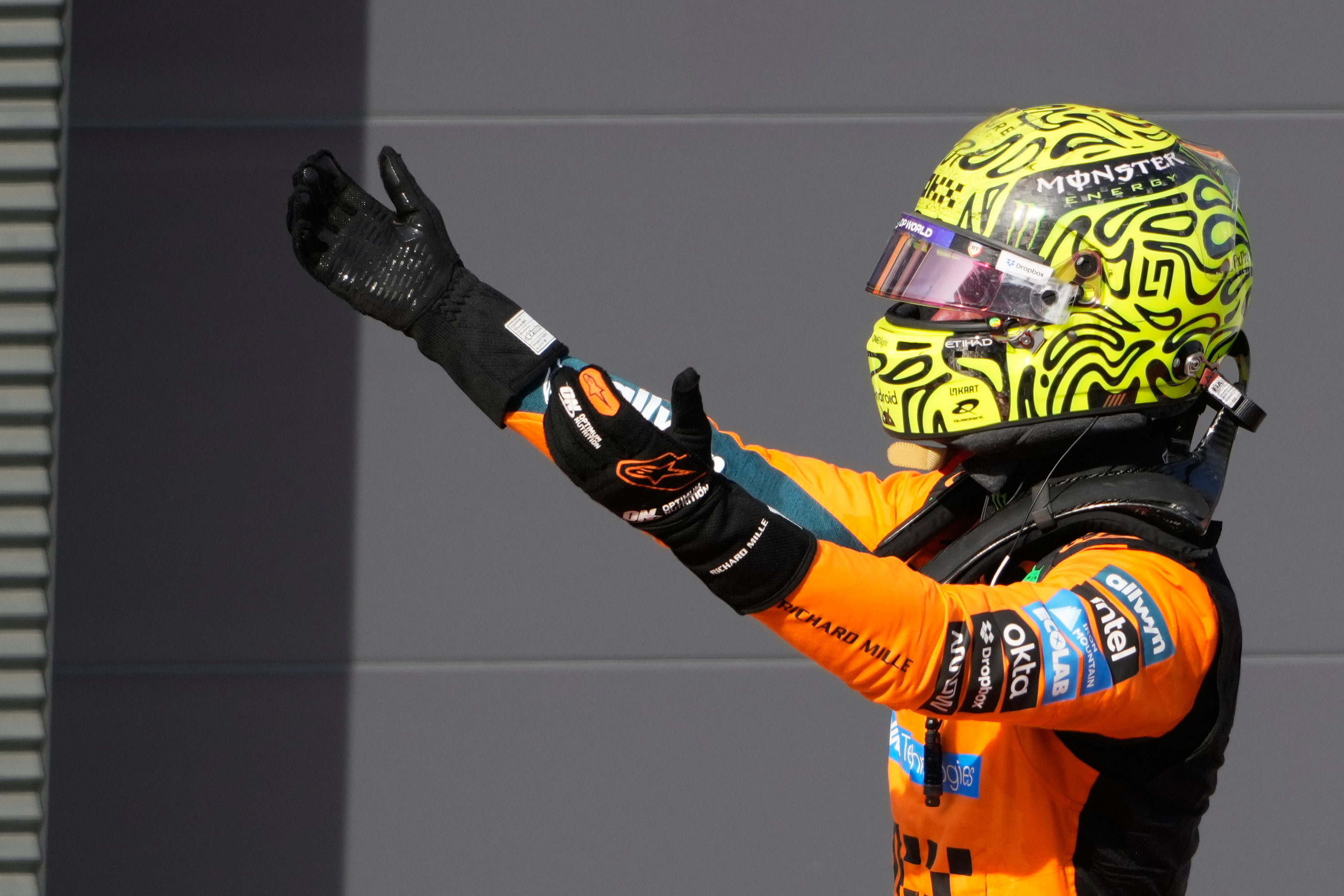 McLaren driver Lando Norris of Britain celebrates after winning the Formula One Hungarian Grand Prix auto race, at the Hungaroring racetrack in Mogyorod, near Budapest, Hungary, Sunday, July 26, 2026. (AP Photo/Darko Bandic)