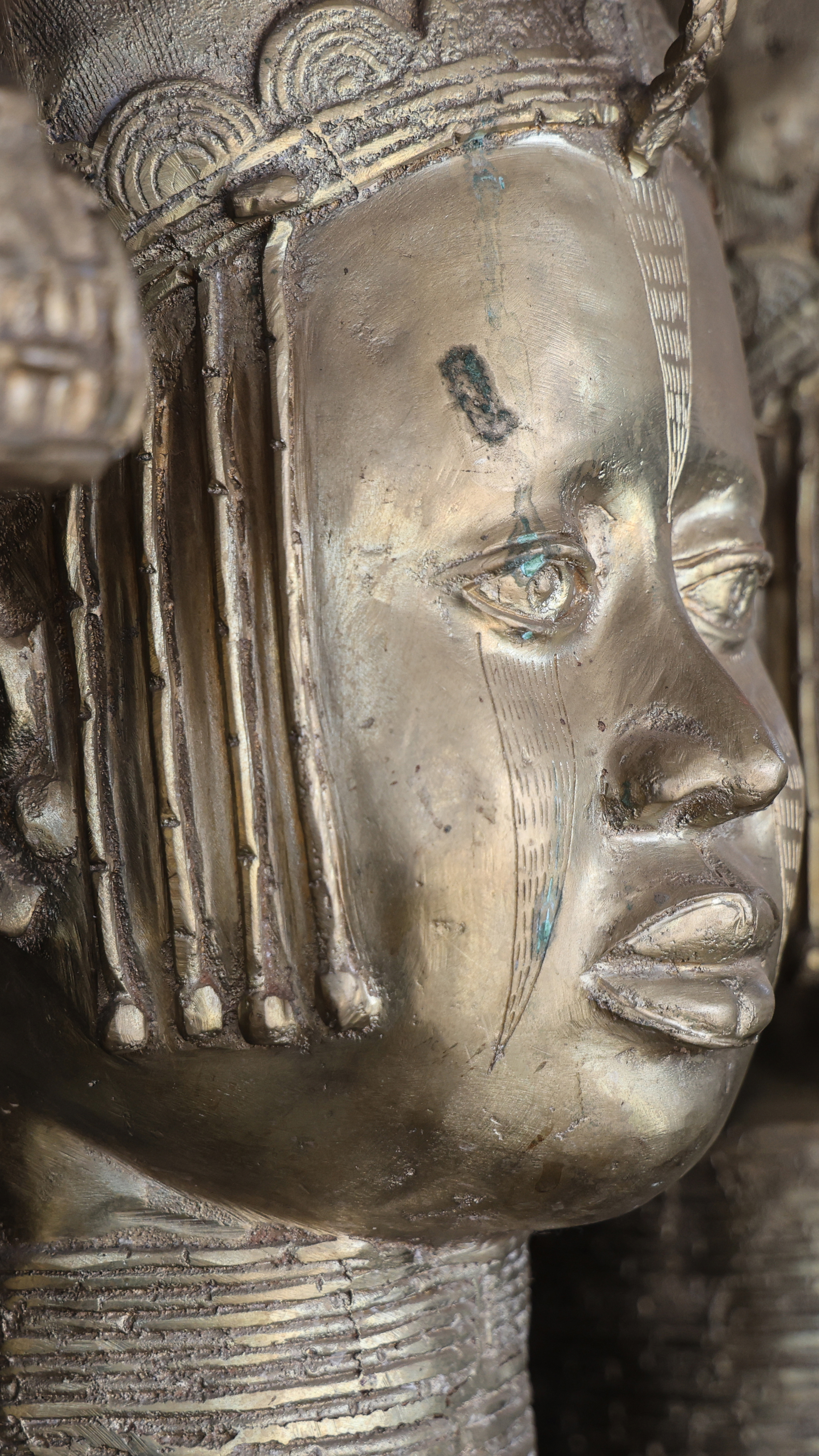 Bronze portrait heads on display in Benin City. Once created for the royal court