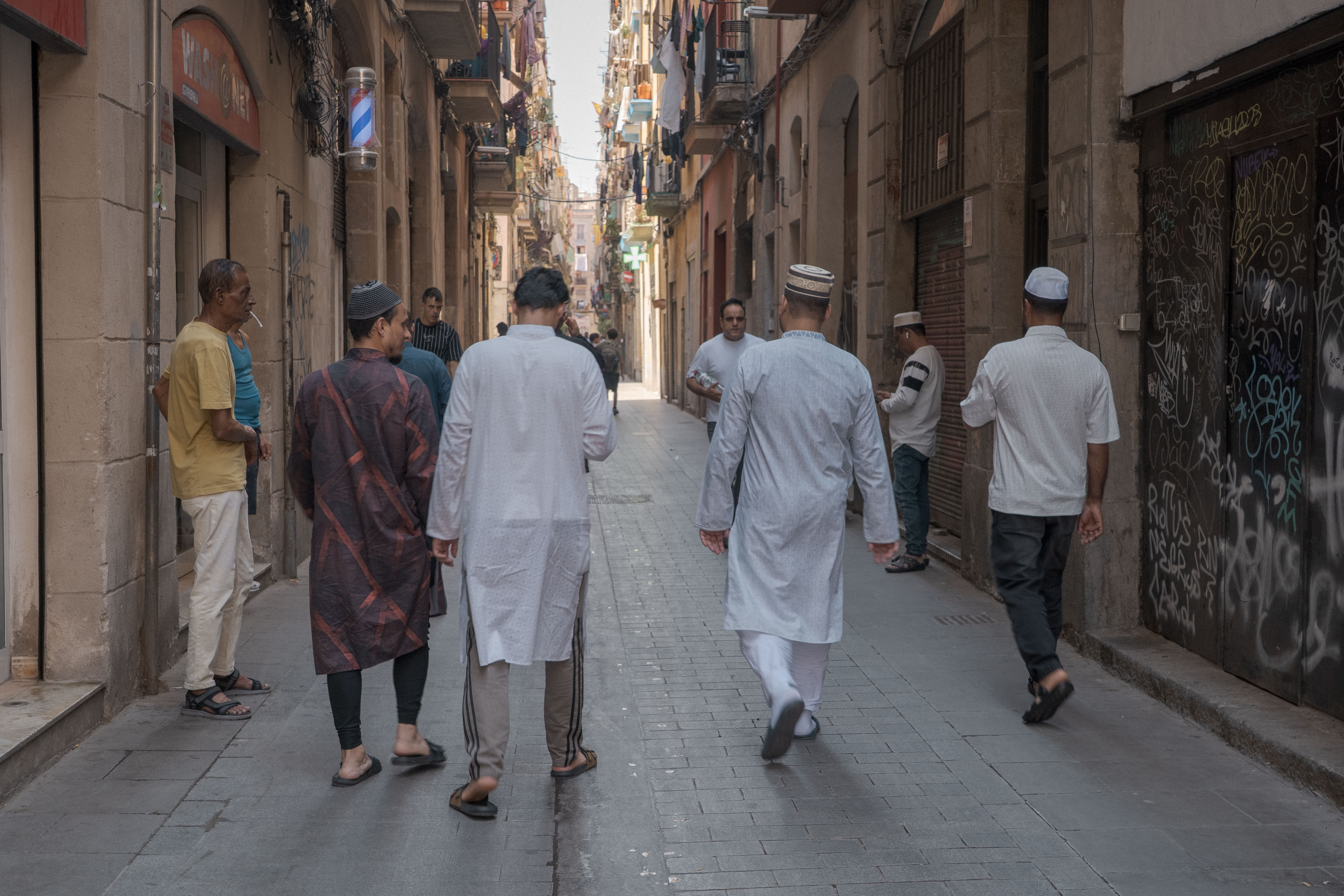 Walking through one of the narrow streets in El Raval