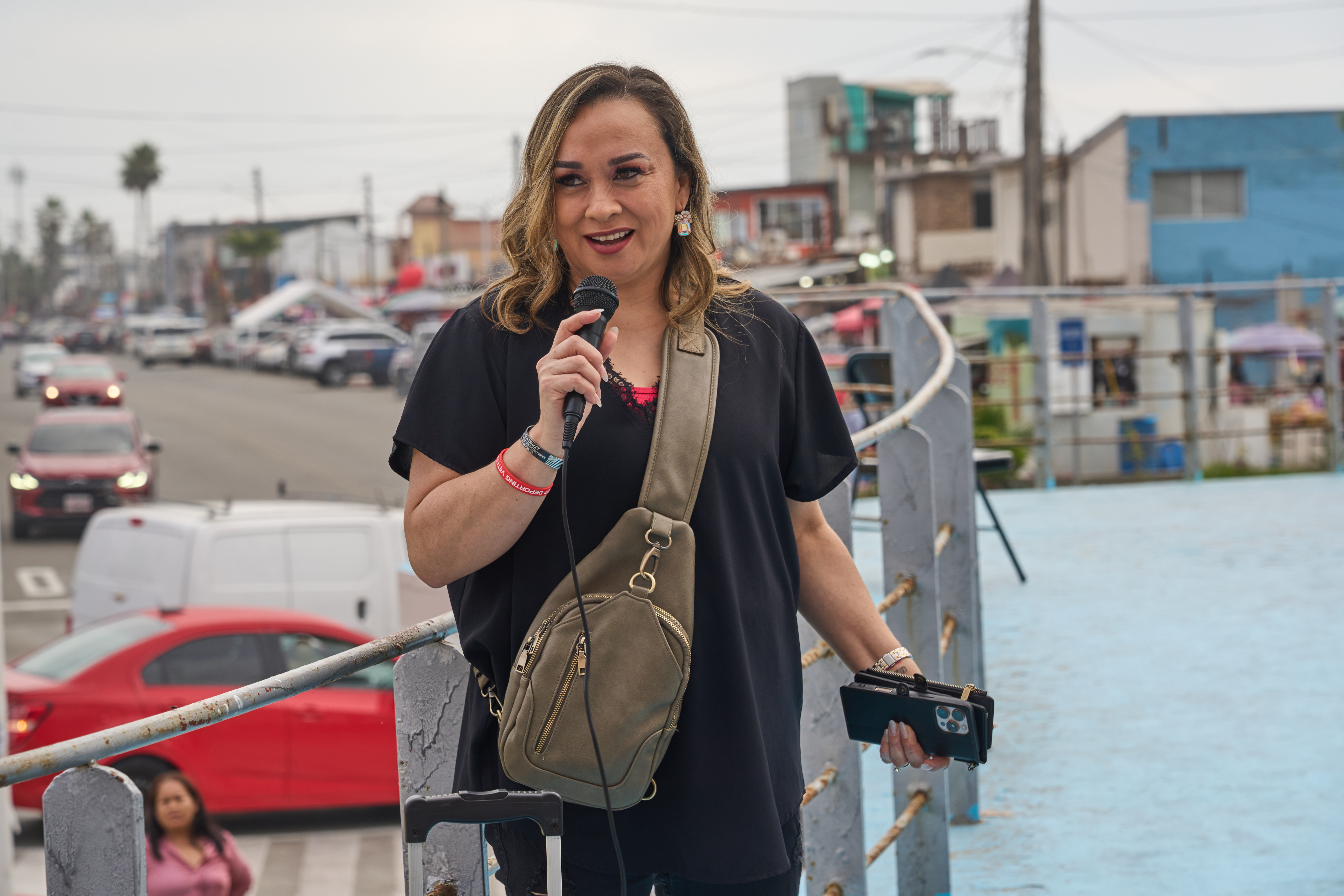 Danitza James, also a veteran and resident of Virginia, speaks to her fellow deported veterans during the Day of the Dead celebration in the city of Tijuana.