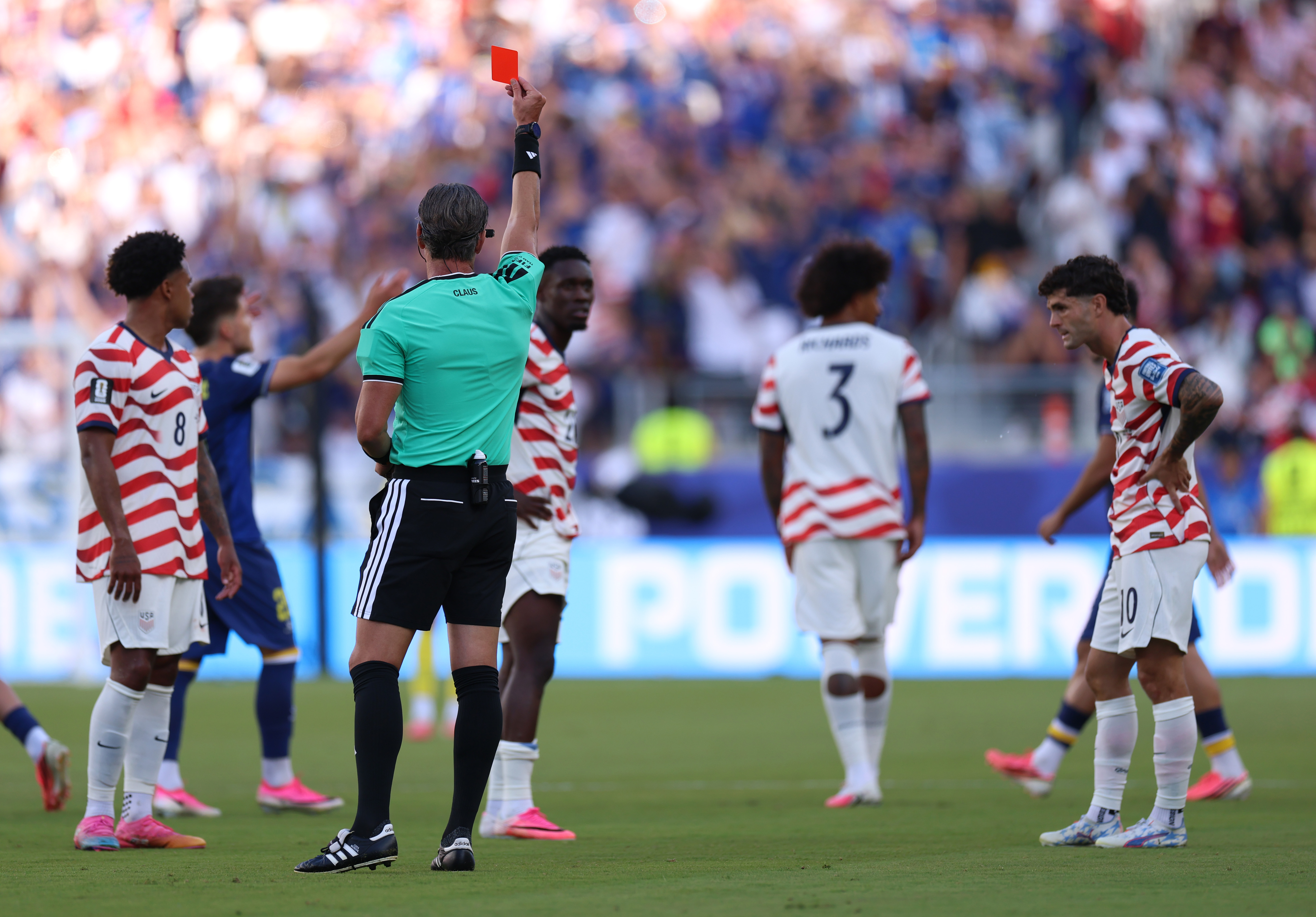 SANTA CLARA, CALIFORNIA - JULY 01: Referee Raphael Claus shows Folarin Balogun #20 of the United States a red card for a foul on Tarik Muharemovic #4 of Bosnia and Herzegovina during the FIFA World Cup 2026 Round of 32 match between USA and Bosnia and Herzegovina at San Francisco Bay Area Stadium on July 01, 2026 in Santa Clara, California. (Photo by Maja Hitij - FIFA/FIFA via Getty Images)