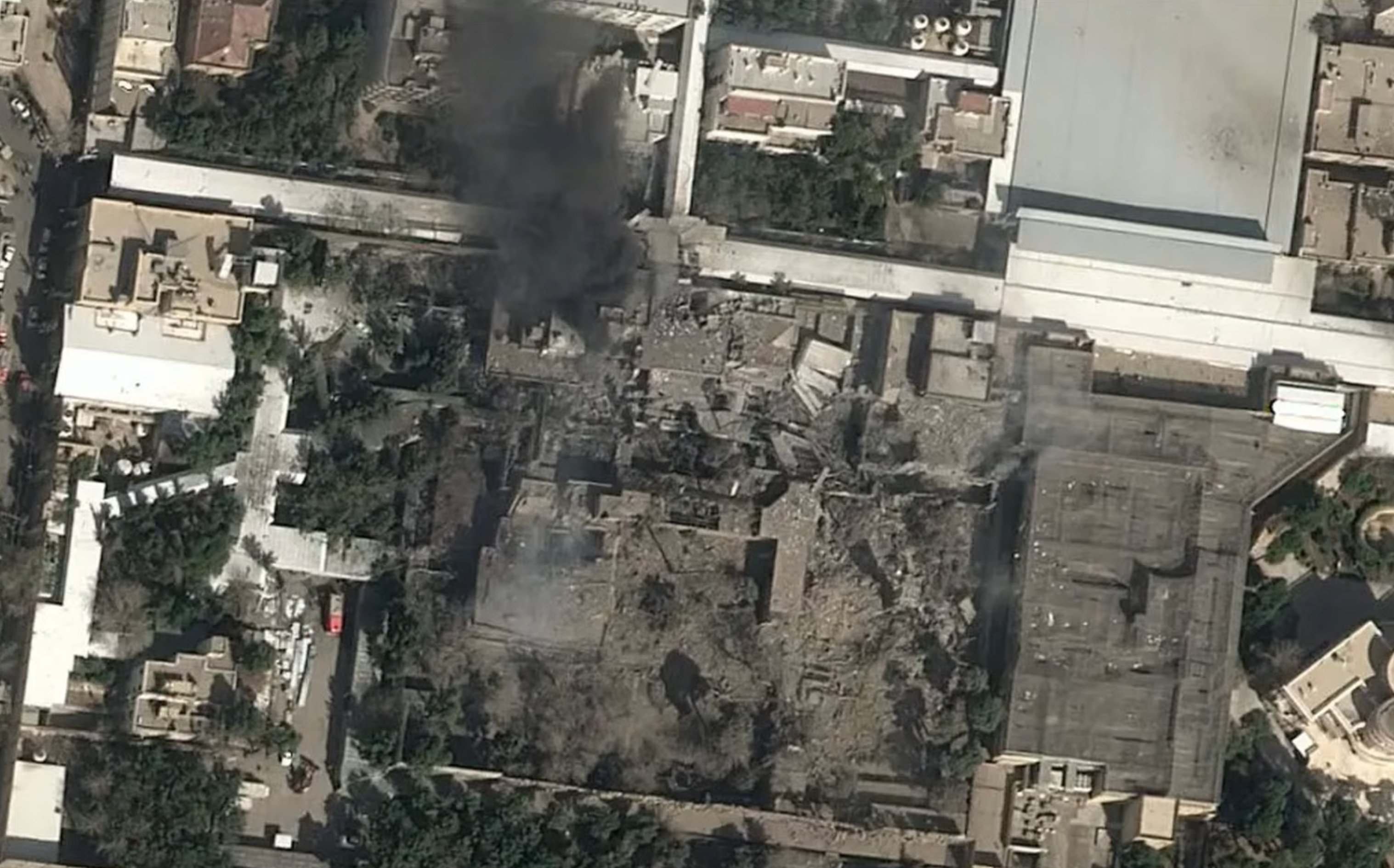 A satellite image shows black smoke rising and heavy damage at the compound of Iran’s Supreme Leader Ayatollah Ali Khamenei [Reuters]