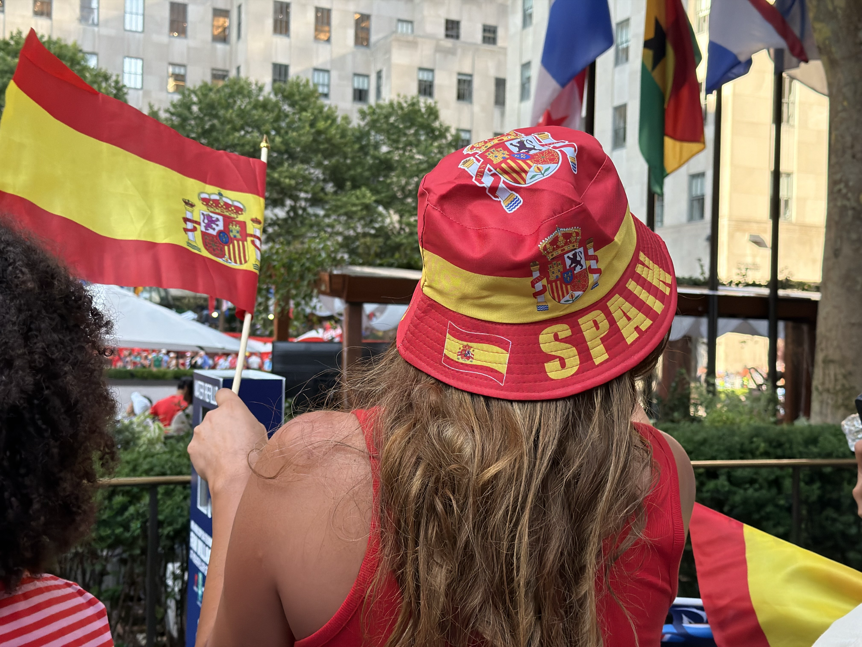 Spain fans celebrate their team winning the World Cup outside the Rockefeller Centre, New York City