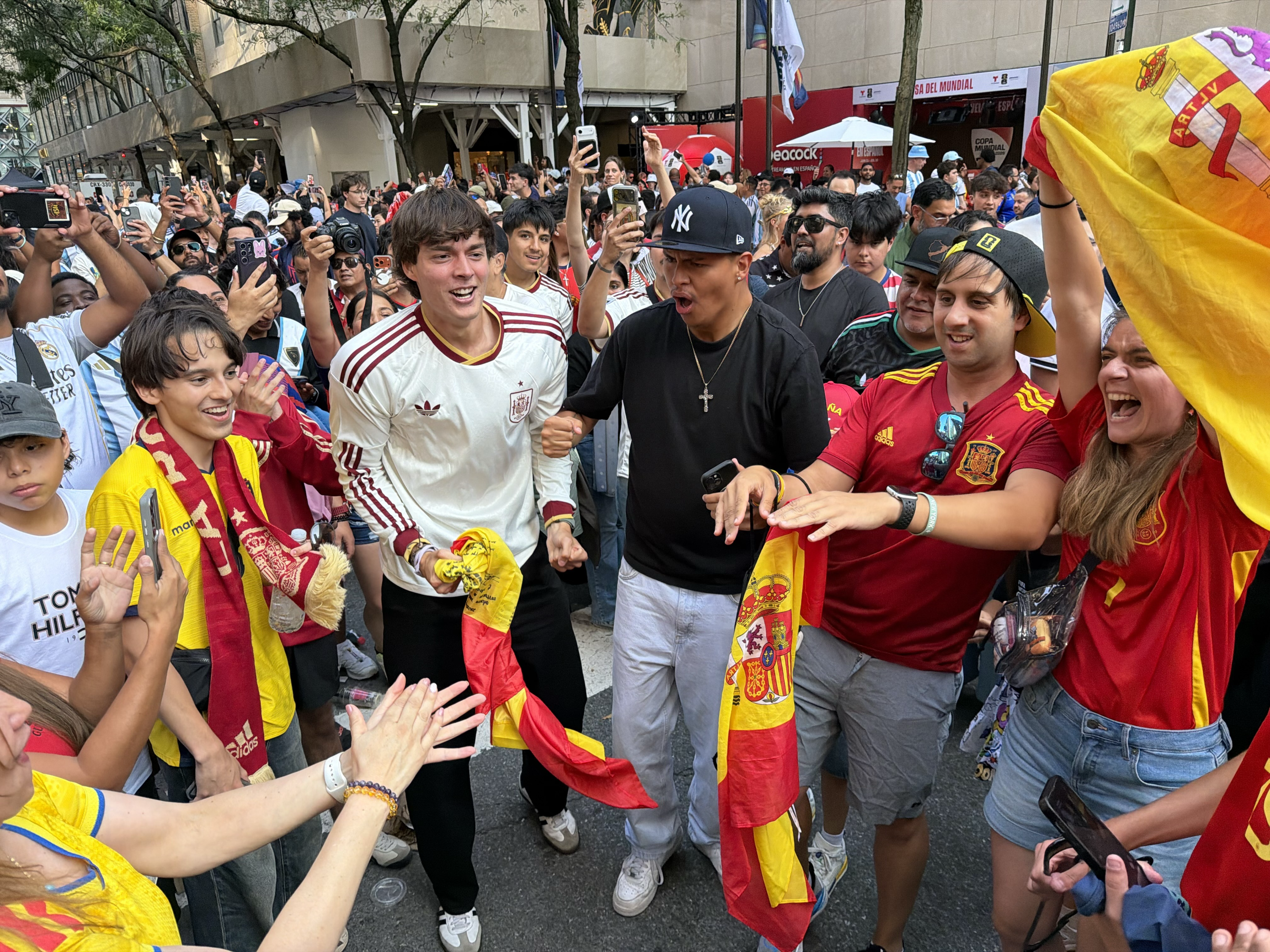 Spain fans celebrate their team winning the World Cup outside the Rockefeller Center, New York City