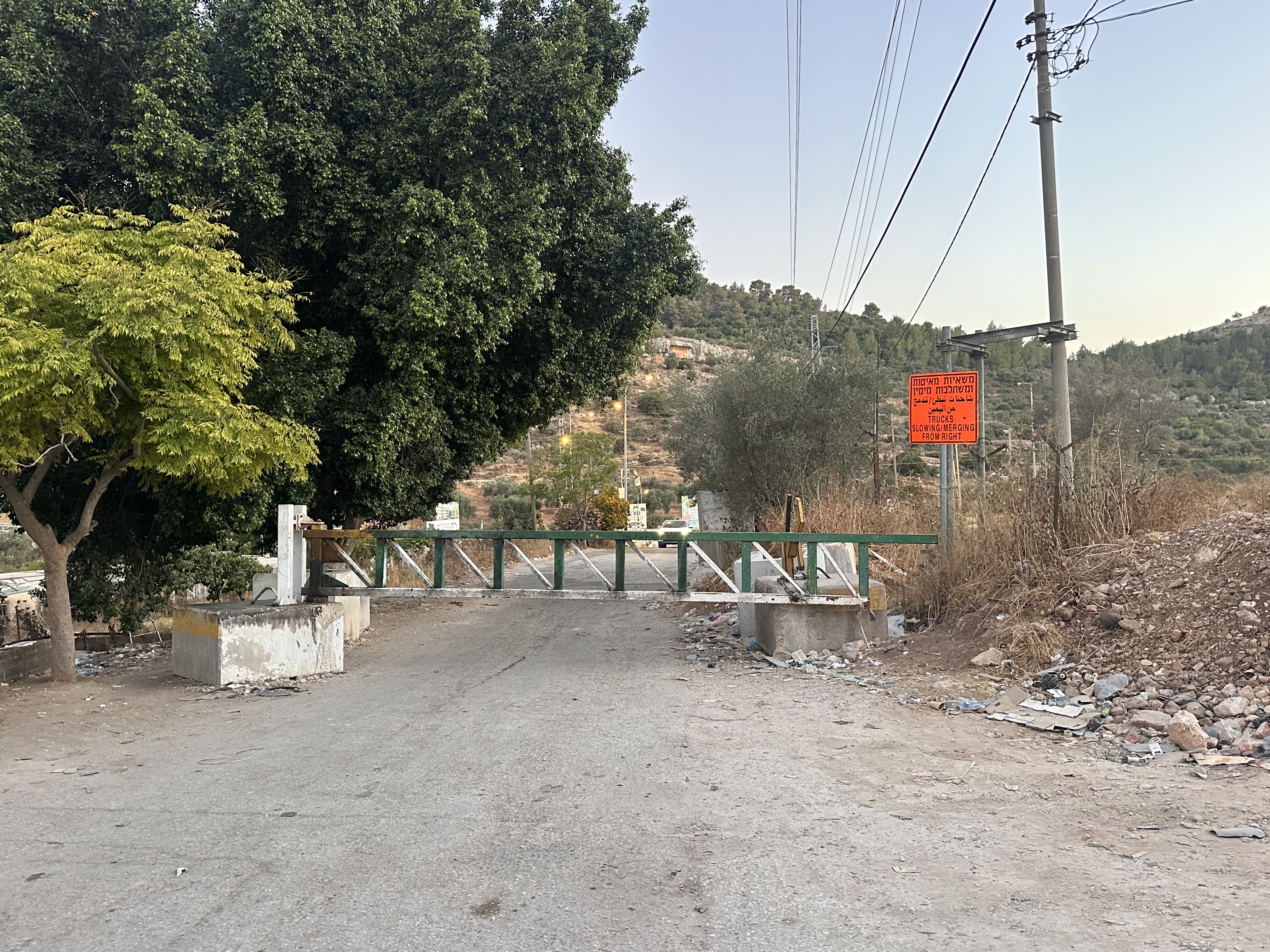 A locked Israeli military gate separates Deir Ammar and two nearby villages from the main road into Ramallah. Residents say the closure has left about 18,000 people with restricted access to essential services since late February