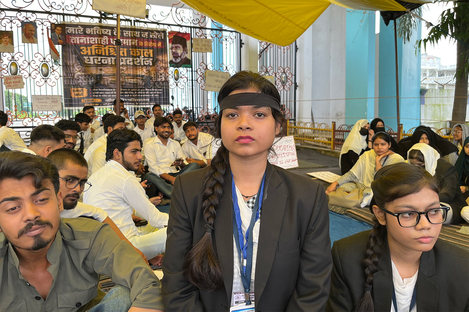 Iqra at the protest site outside the university gate
