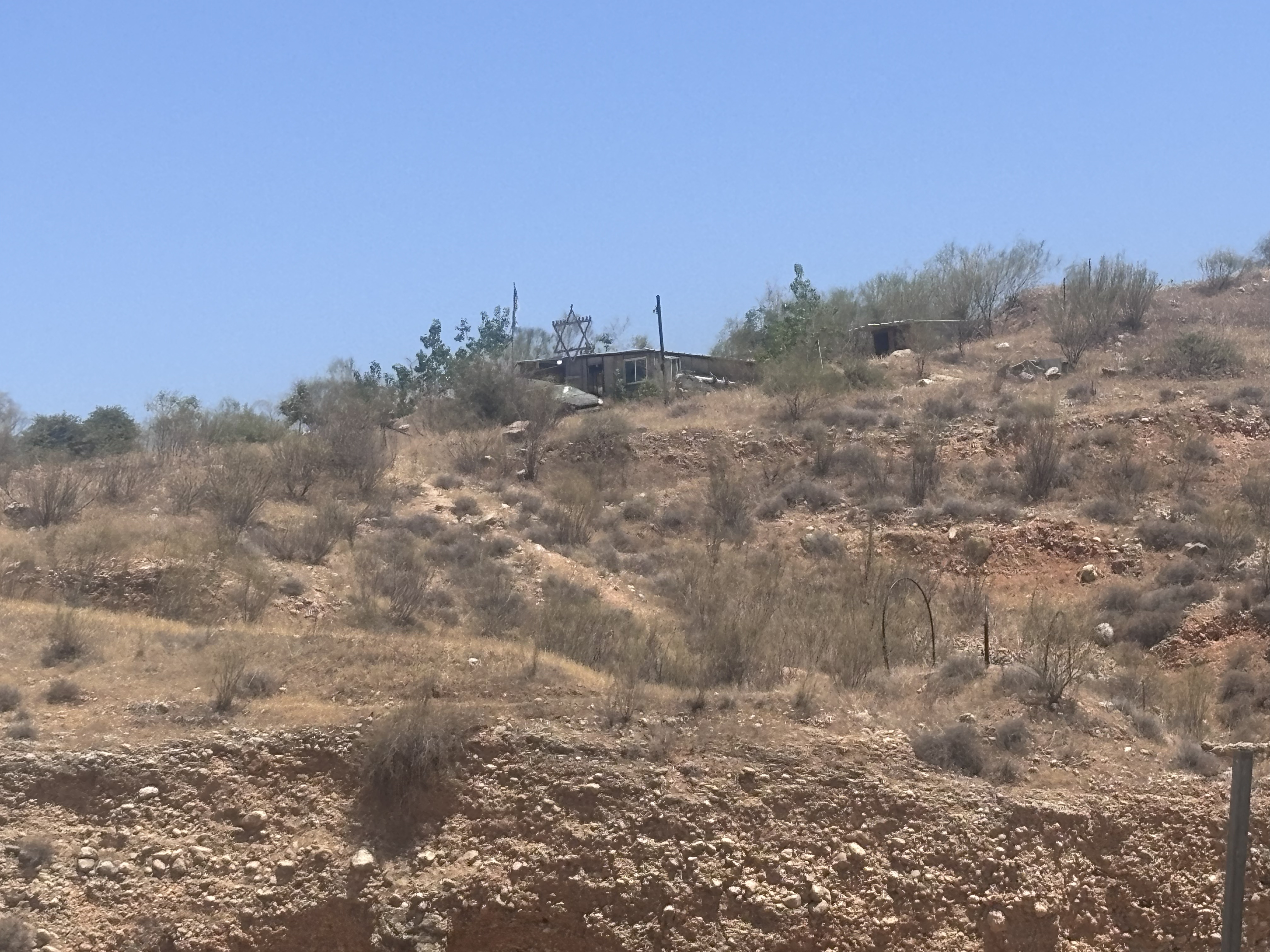 A long-established illegal Israeli settler outpost located right above a Palestinian village in the Jordan Valley [Al Jazeera]
