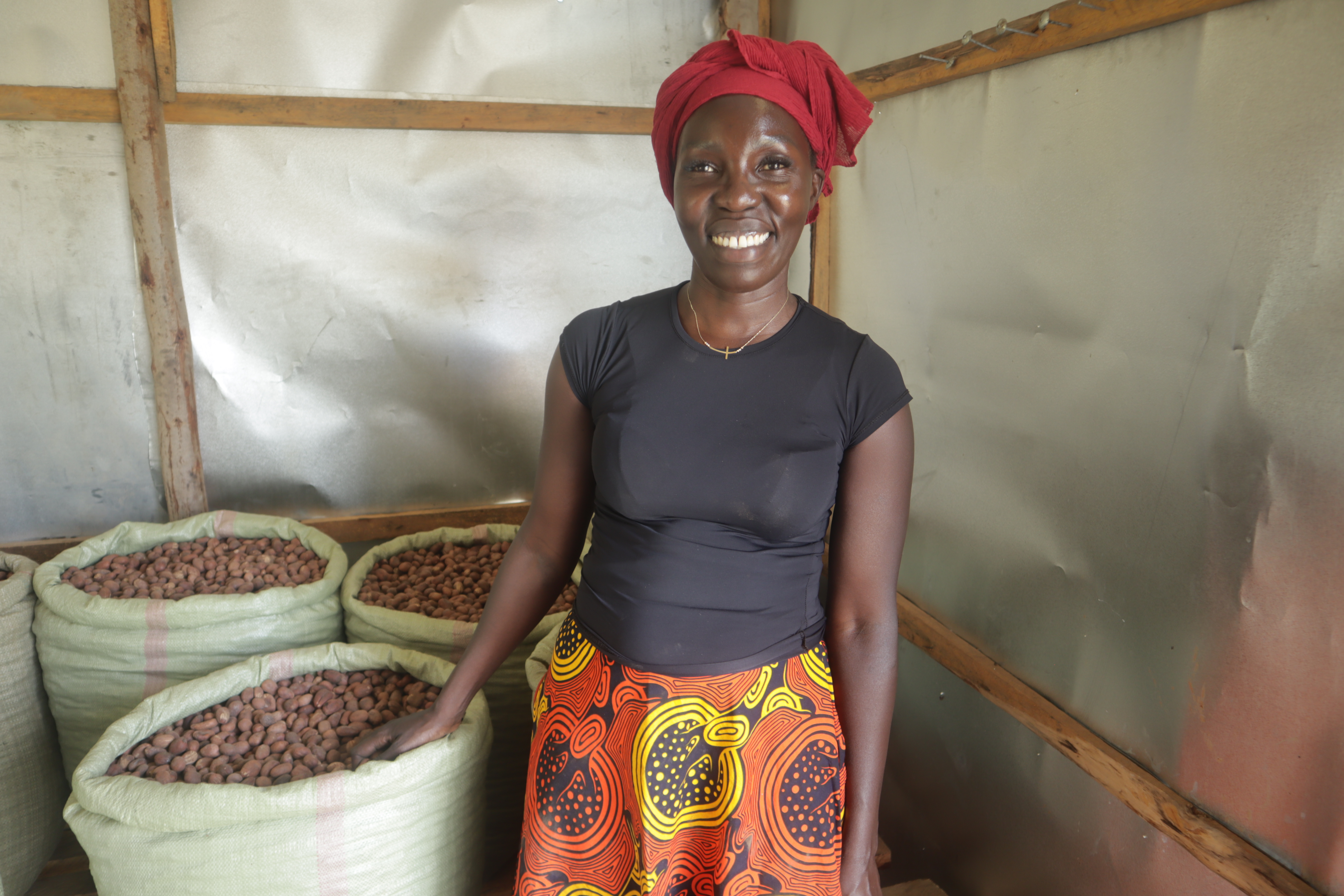 Lucy Everlyn Atim in her store were she keeps harvested shea nuts. Photo by John Okot.