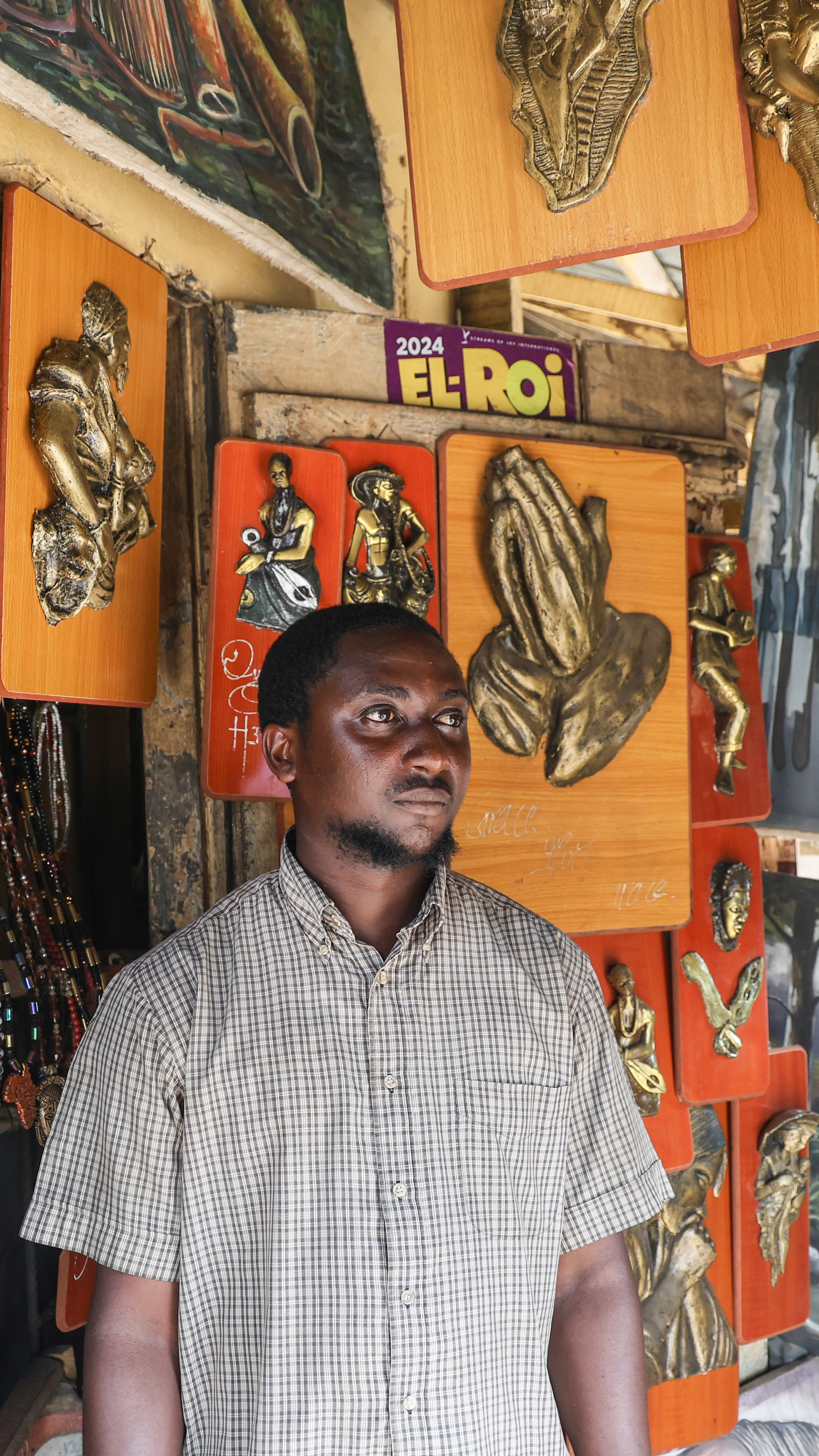 Bronze caster Otasowie at his workshop in Benin City