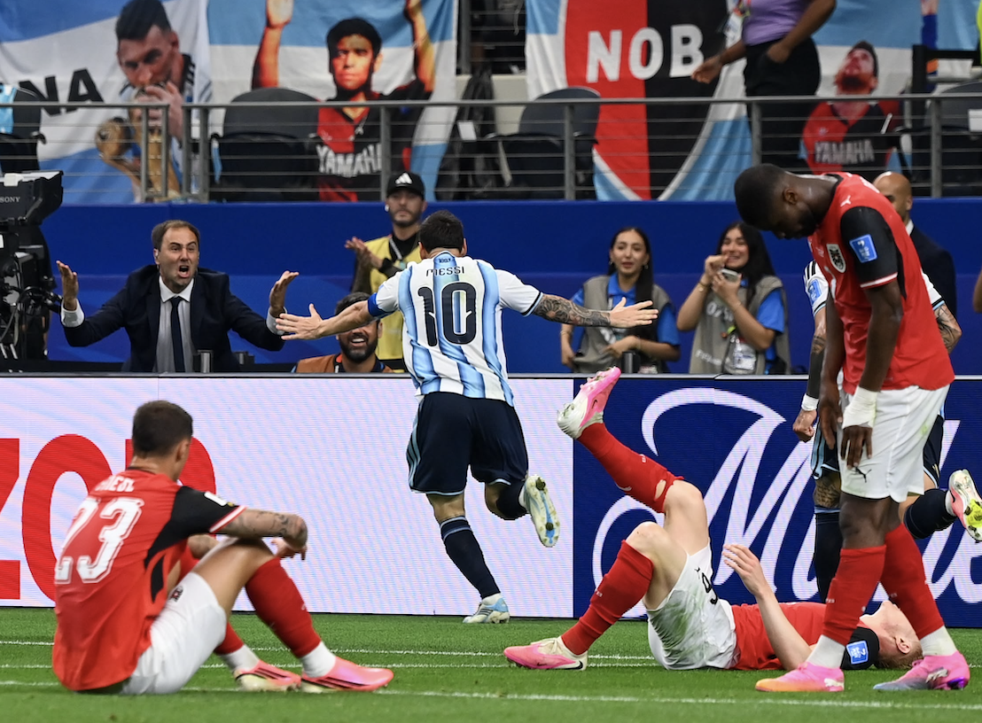 Lionel Messi leaves a trail of defeated Austrian players after scoring a goal [Debjoy Biswas]