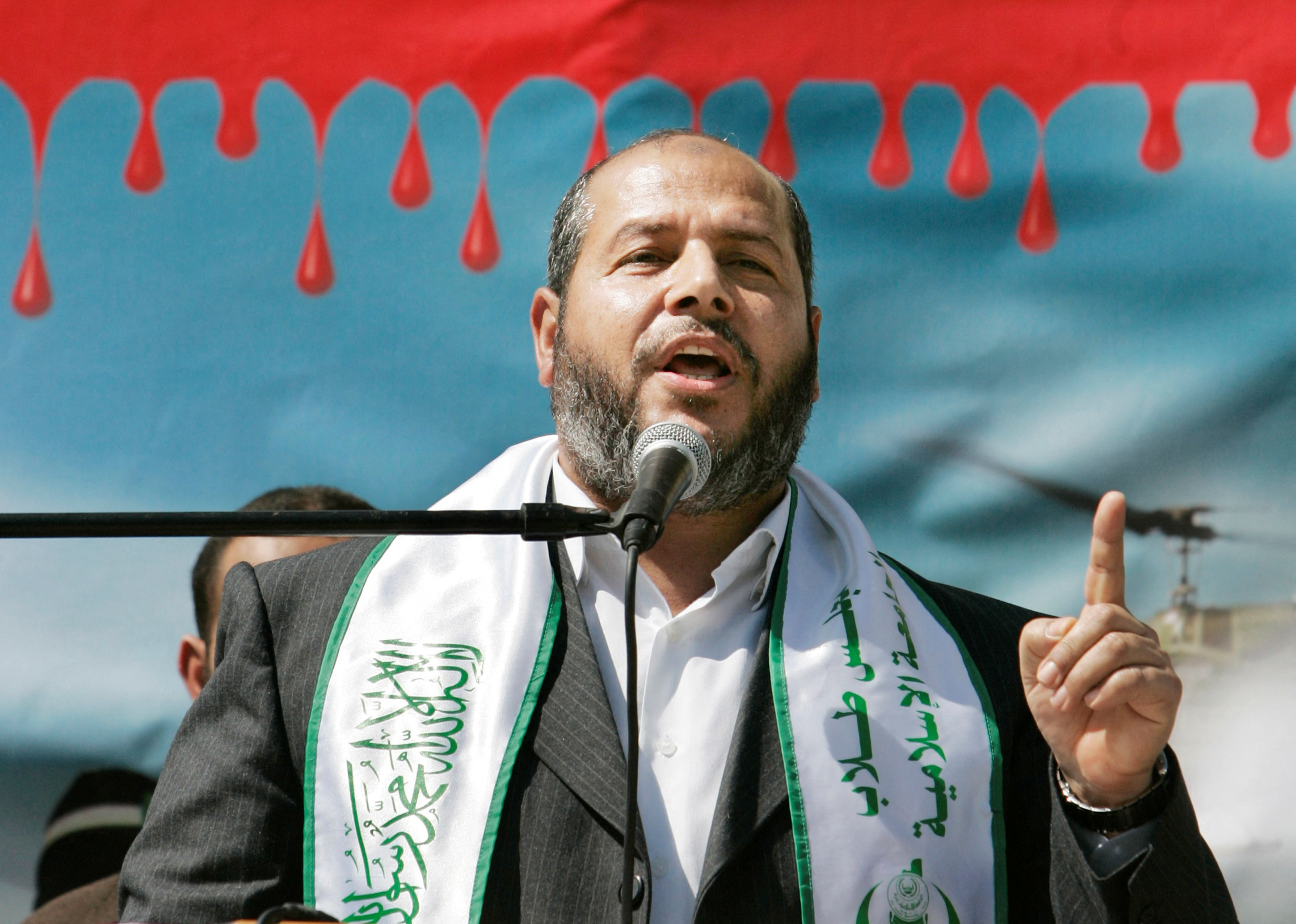 .FILE PHOTO: Senior Hamas leader Khalil al-Hayya, who lost his son last week in an Israeli airstrike, speaks during an anti-Israel rally organised by the Hamas movement in Gaza March 4, 2008. Egypt called on Tuesday for a ceasefire between Israel and the Islamist movement Hamas in Gaza but the United States said only negotiations between Israel and the Palestian Authority could lead to lasting peace. REUTERS/Mohammed Salem/File Photo