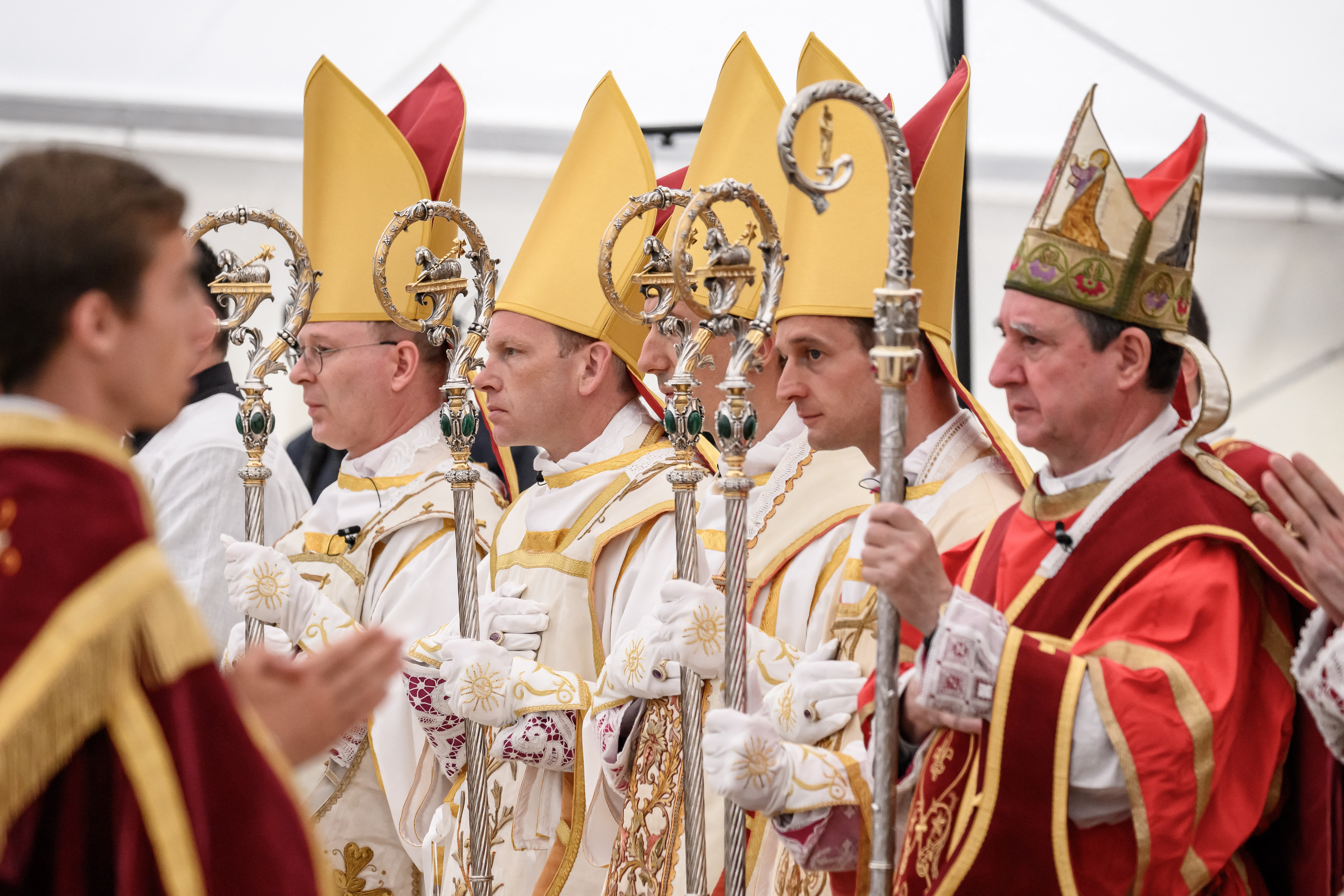(From L) The new traditionalist Catholic consacred bishops Swiss Pascal Schreiber, US' Michael Goldade, French Michel Poinsinet de Sivry and French Marc Hanappier stand next to Spanish born bishop Alfonso de Galarreta during the schismatic consecration of bishops by the traditionalist Catholic Society of Saint Pius X (SSPX) in Econe, western Switzerland, on July 1, 2026.