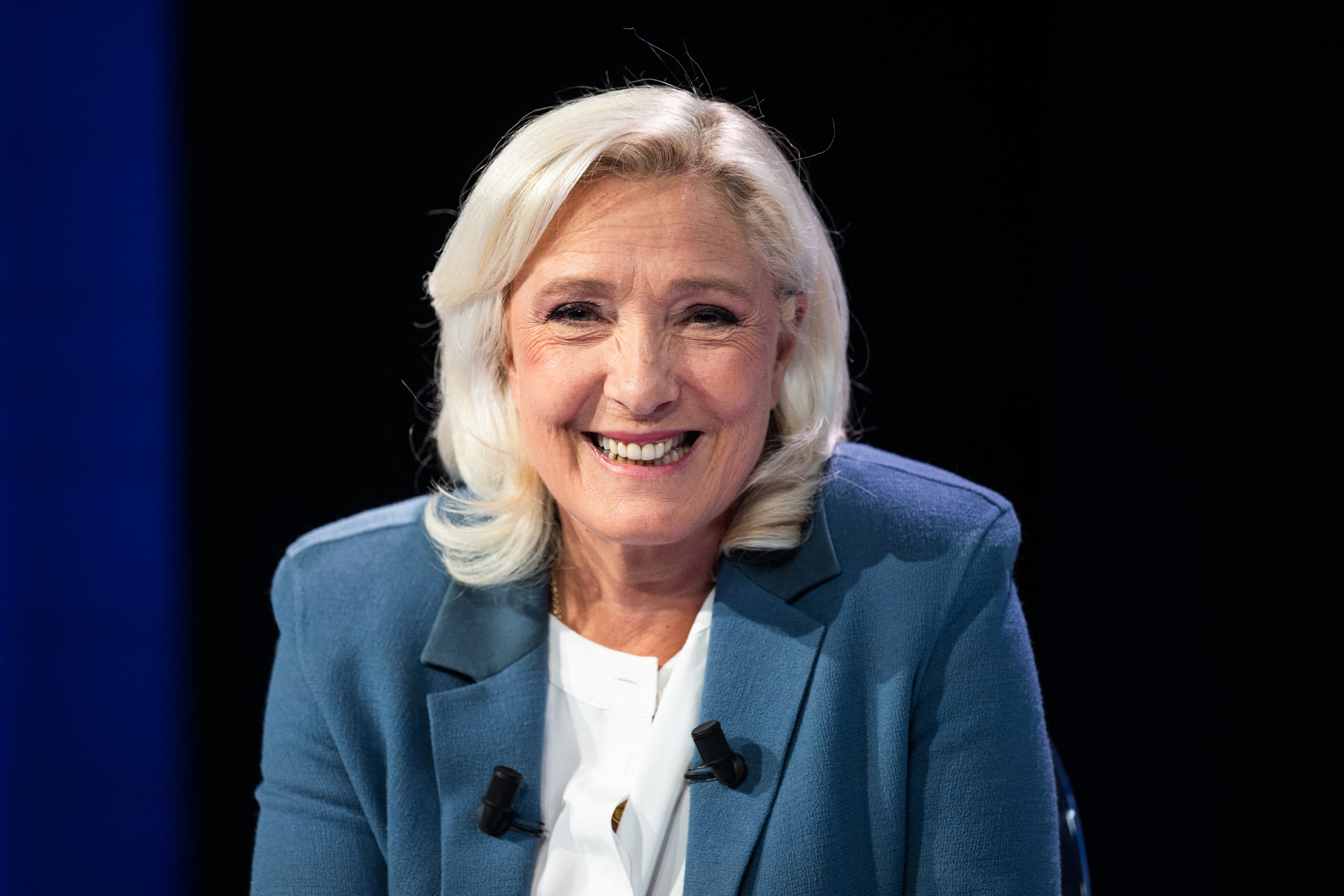 President of Rassemblement National parliamentary group Marine Le Pen poses poses ahead of a television interview entitled "Le Grand Entretien" broadcast on French news channel LCI, in Boulogne-Billancourt, southern of Paris on July 1, 2026. (Photo by Julie SEBADELHA / AFP)