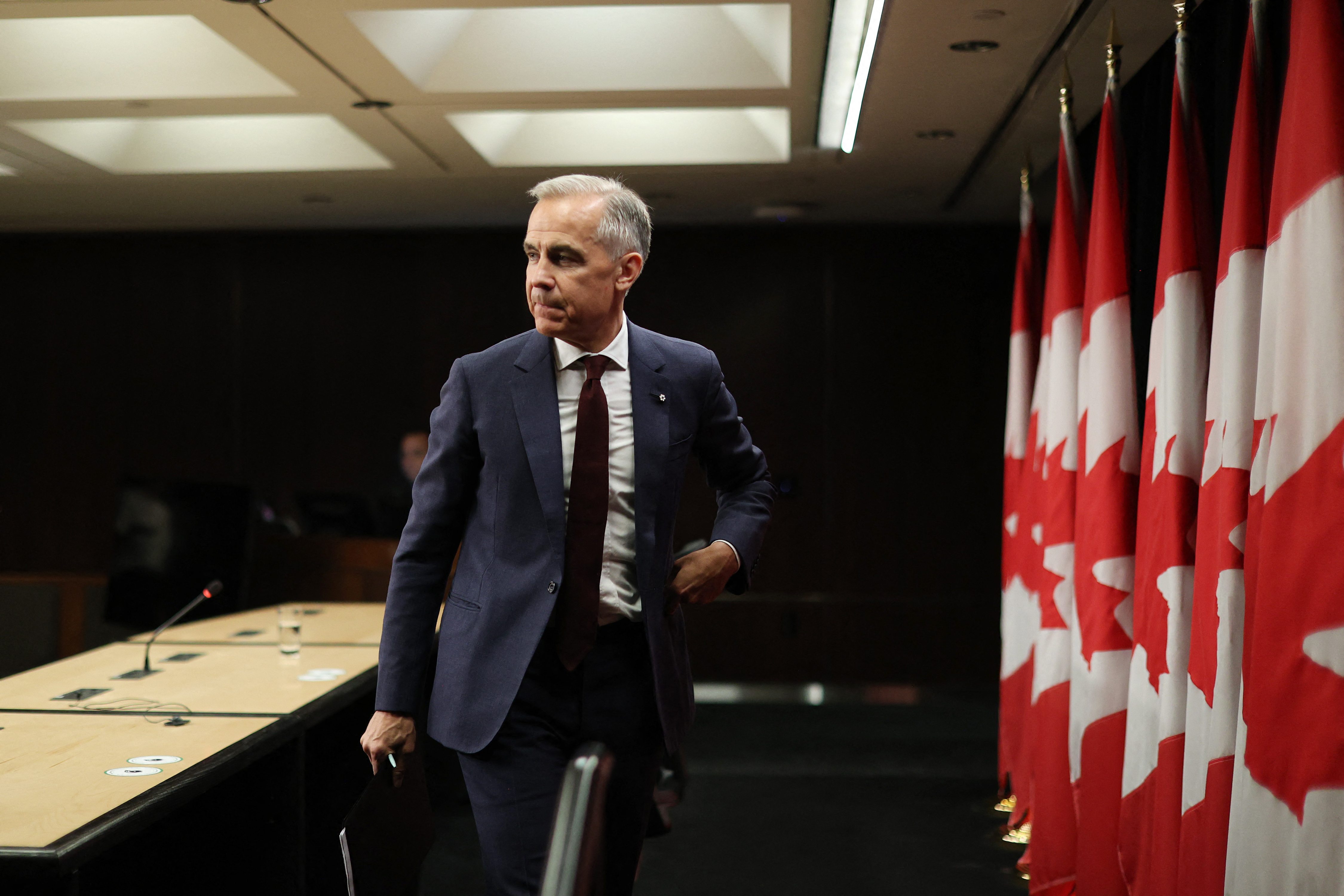 Canadian Prime Minister Mark Carney departs after speaking during a news conference at the National Press Theatre in Ottawa, Canada on June 25, 2026.
