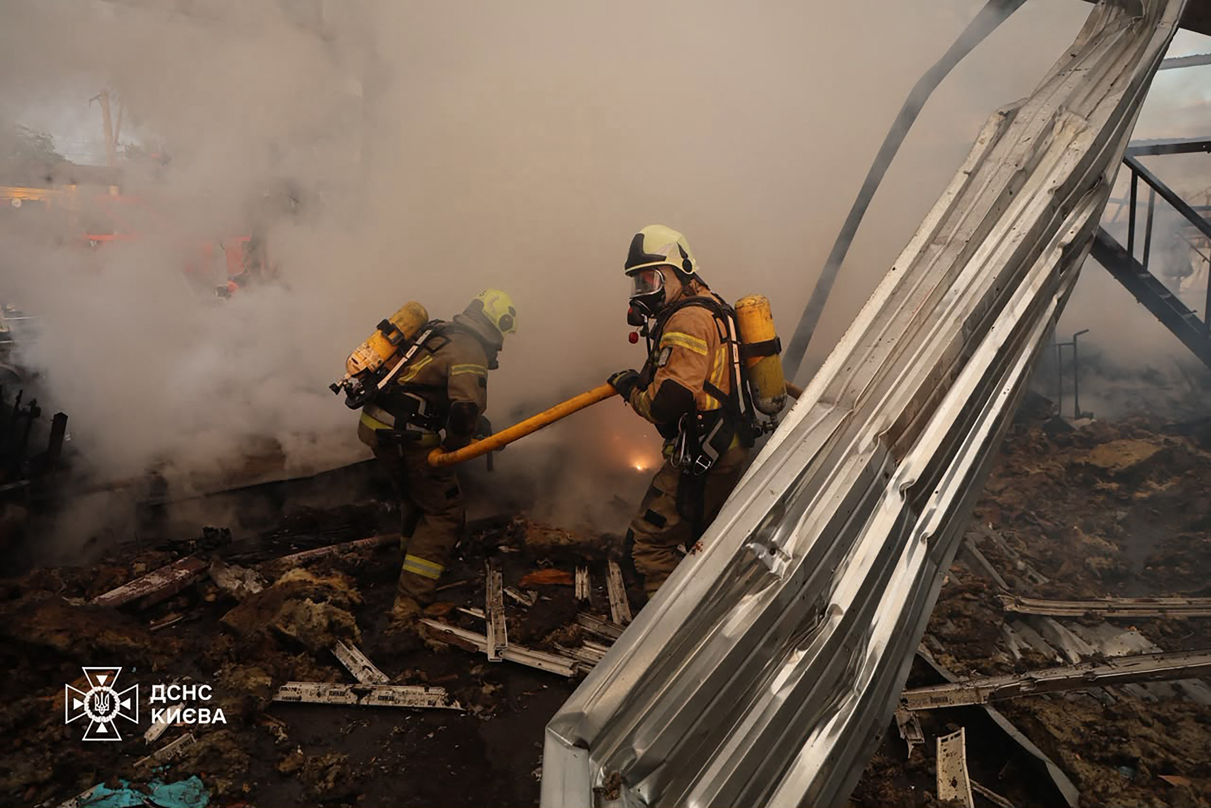 Firefighters extinguishing a fire.
