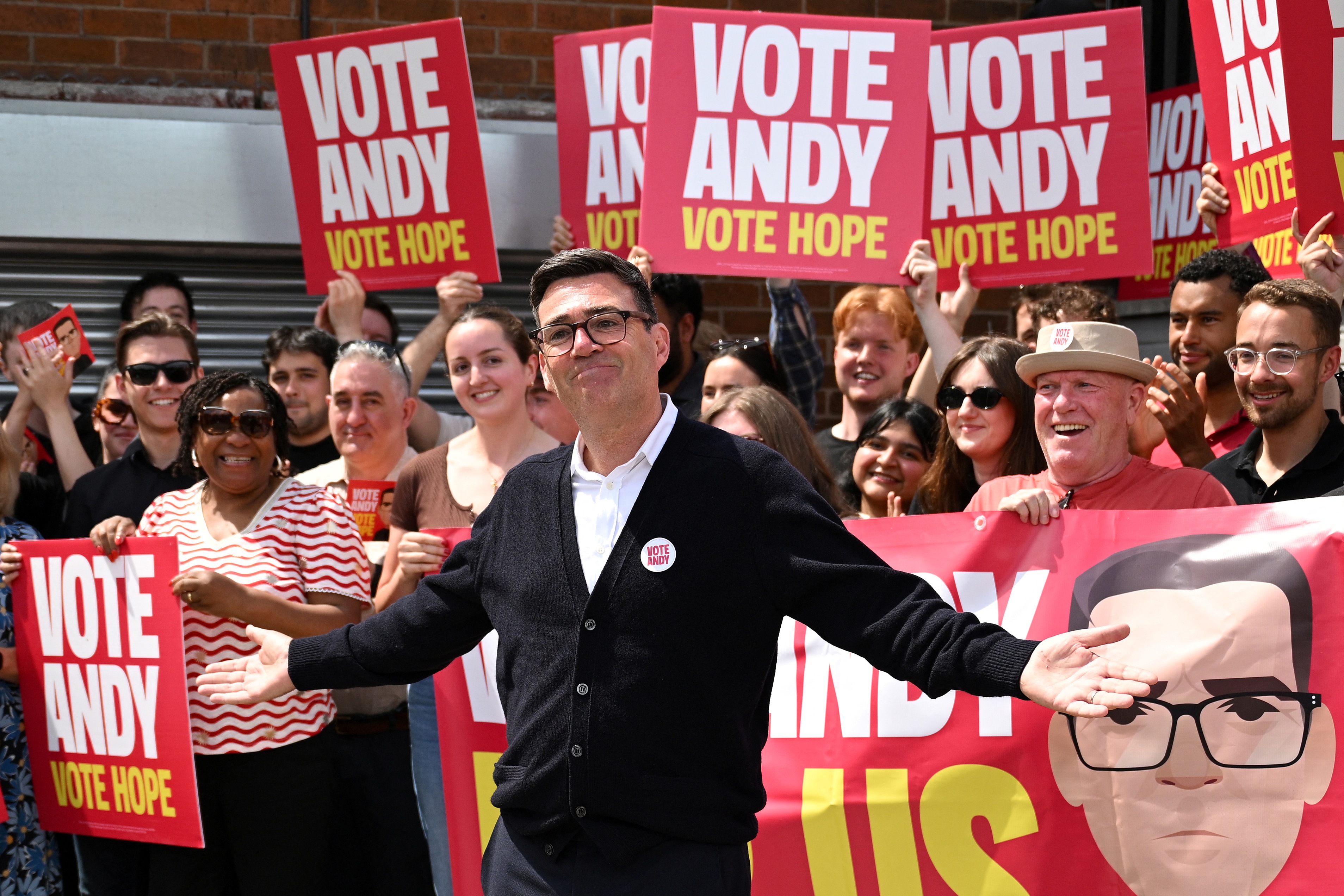 Andy Burnham addresses supporters outside the Labour party campaign office in Ashton in Makerfield, northwest England, on June 18, 2026