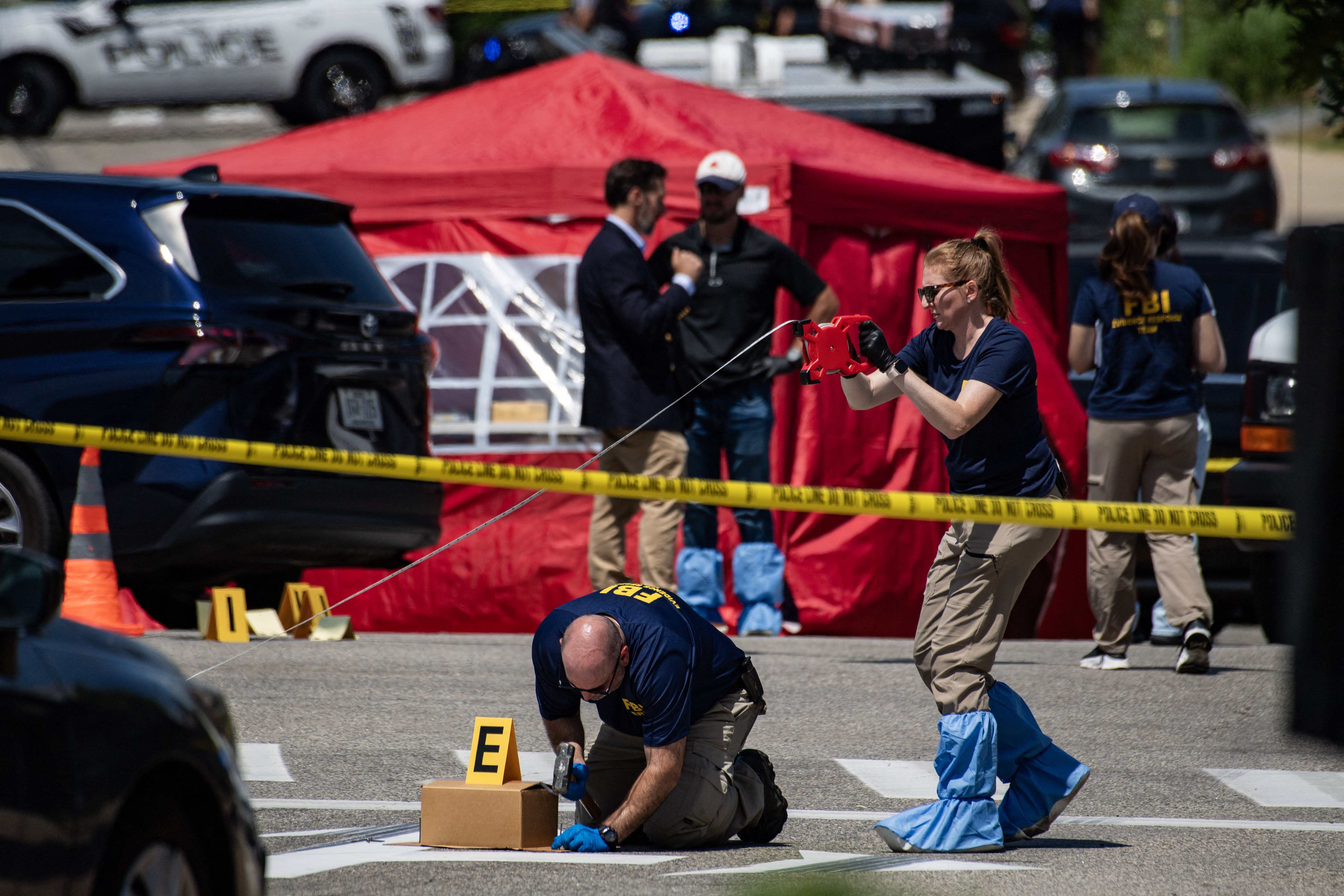 FBI investigators work the scene of an alleged ICE involved shooting in Biddeford, Maine, on July 13, 2026.