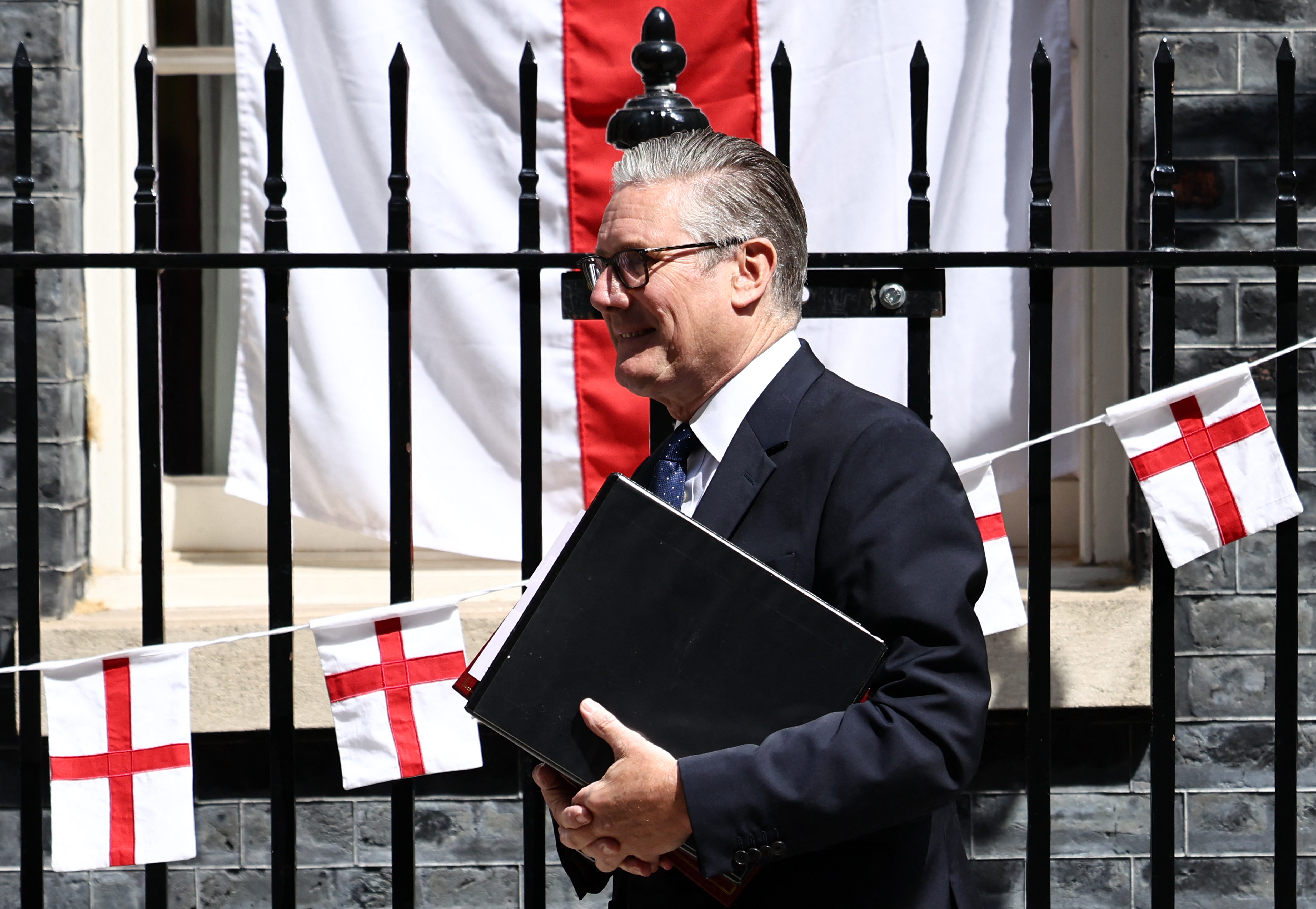 Britain's Prime Minister Keir Starmer leaves 10 Downing Street in central London on July 15, 2026, to take part in his final 'Prime Minister's Questions' (PMQs) session. (Photo by Henry NICHOLLS / AFP)