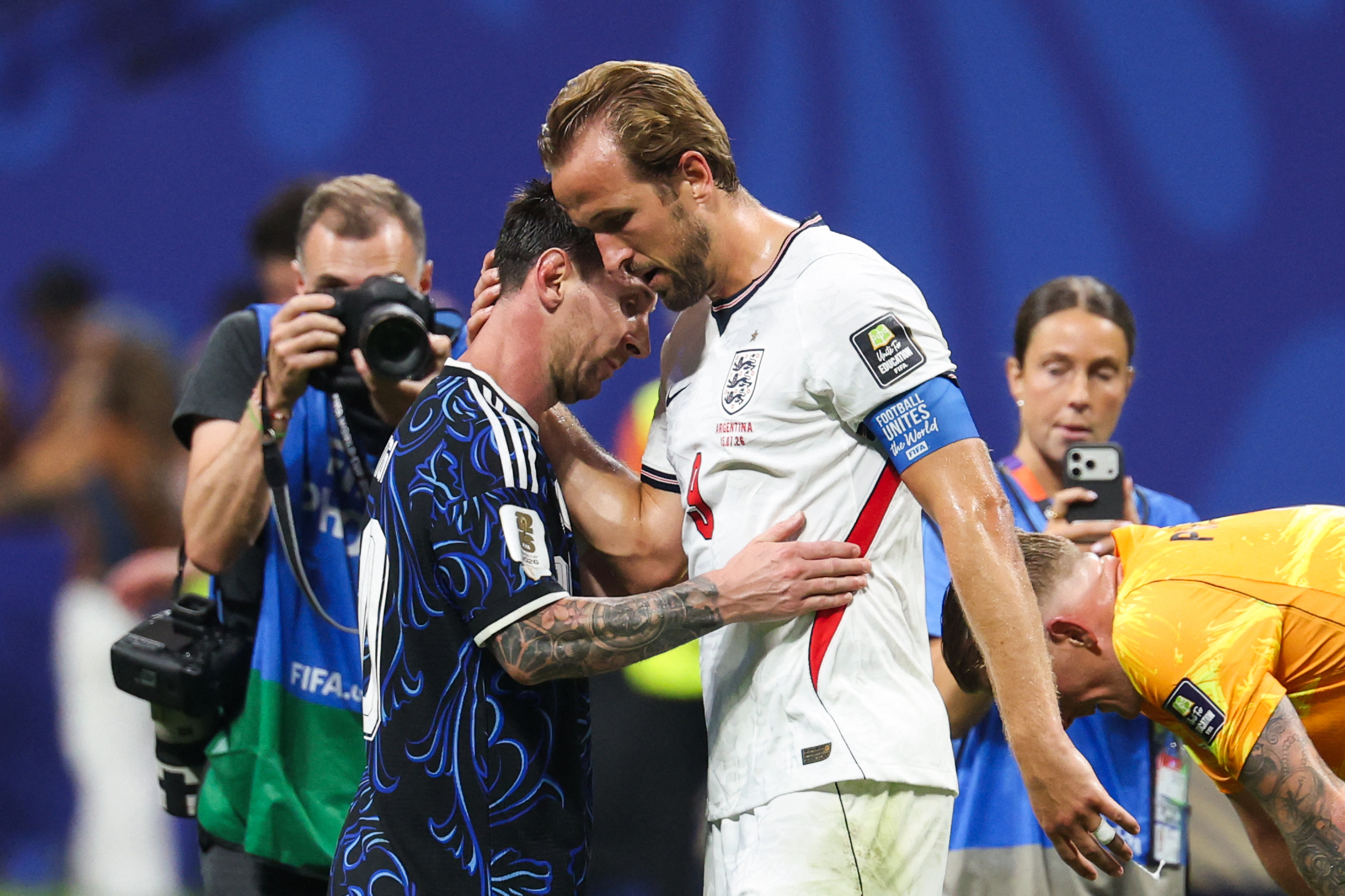 Argentina's forward #10 Lionel Messi (L) and England's forward #09 Harry Kane (R) hug after the 2026 World Cup football tournament semi-final match between England and Argentina at the Atlanta Stadium in Atlanta on July 15, 2026.