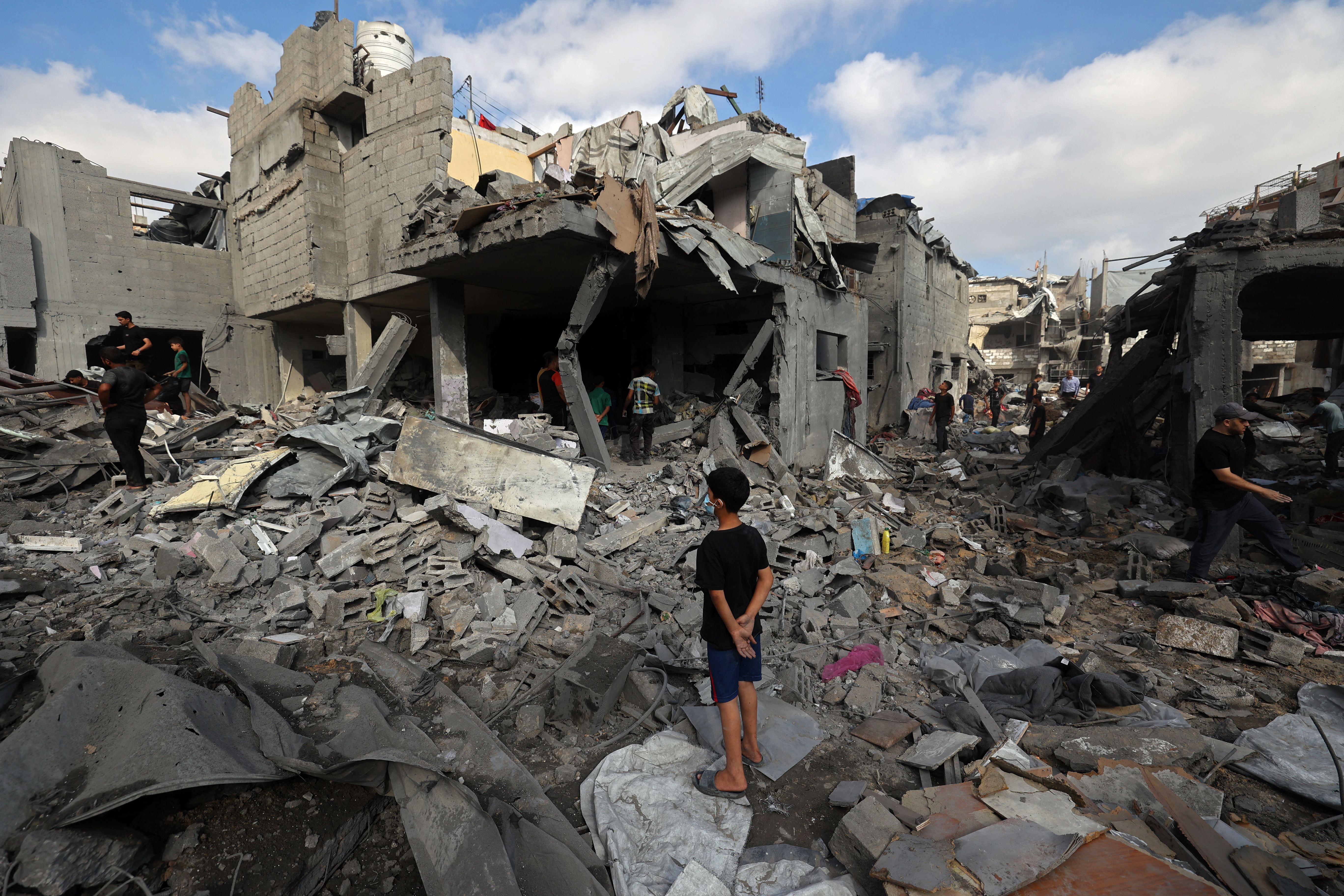 Palestinians inspect the site of an Israeli strike at the Bureij refugee camp in the central Gaza Strip, on July 16, 2026