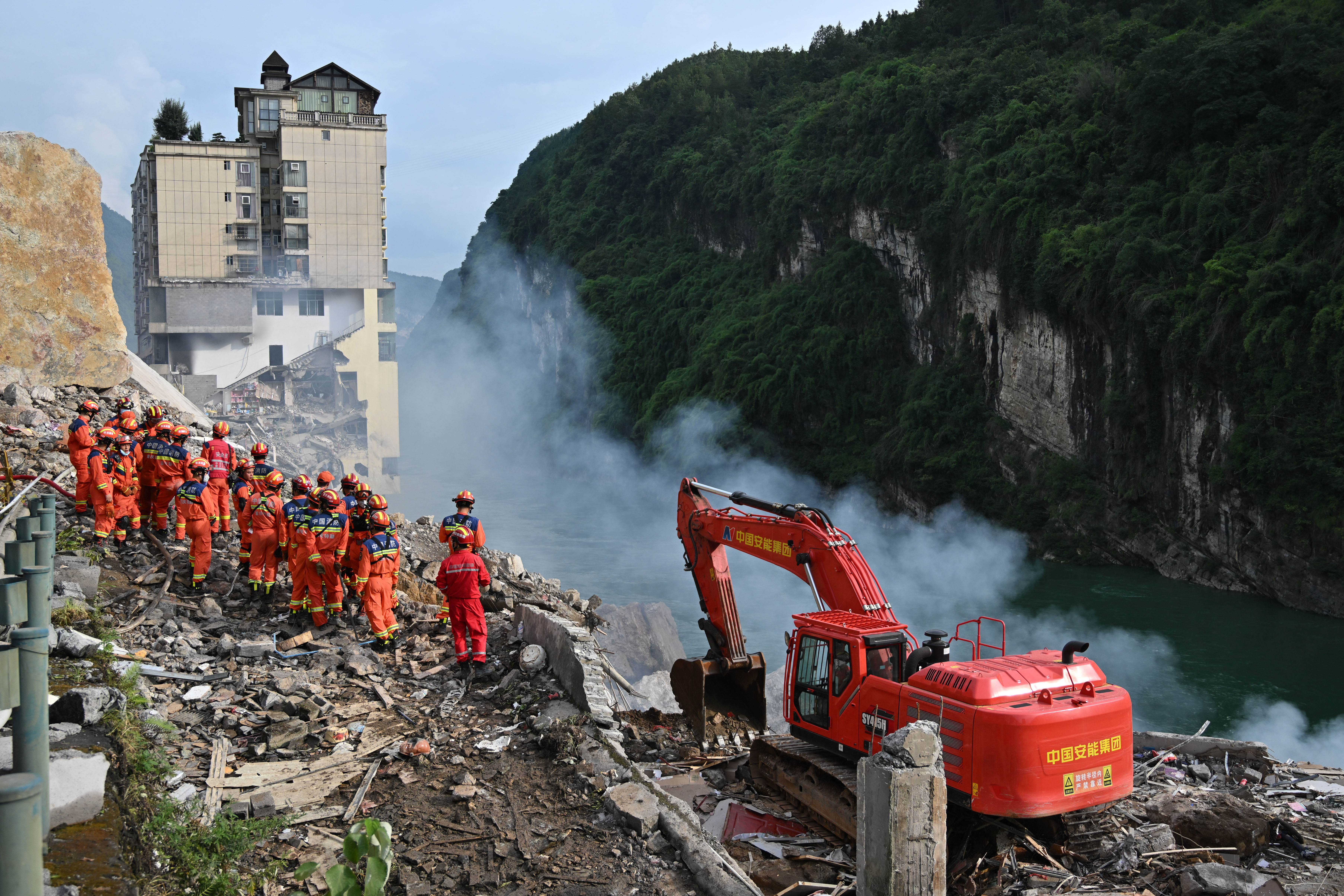 Rescue workers search for survivors at the site of a landslide in Pengshui County in Chongqing, China on July 17, 2026.