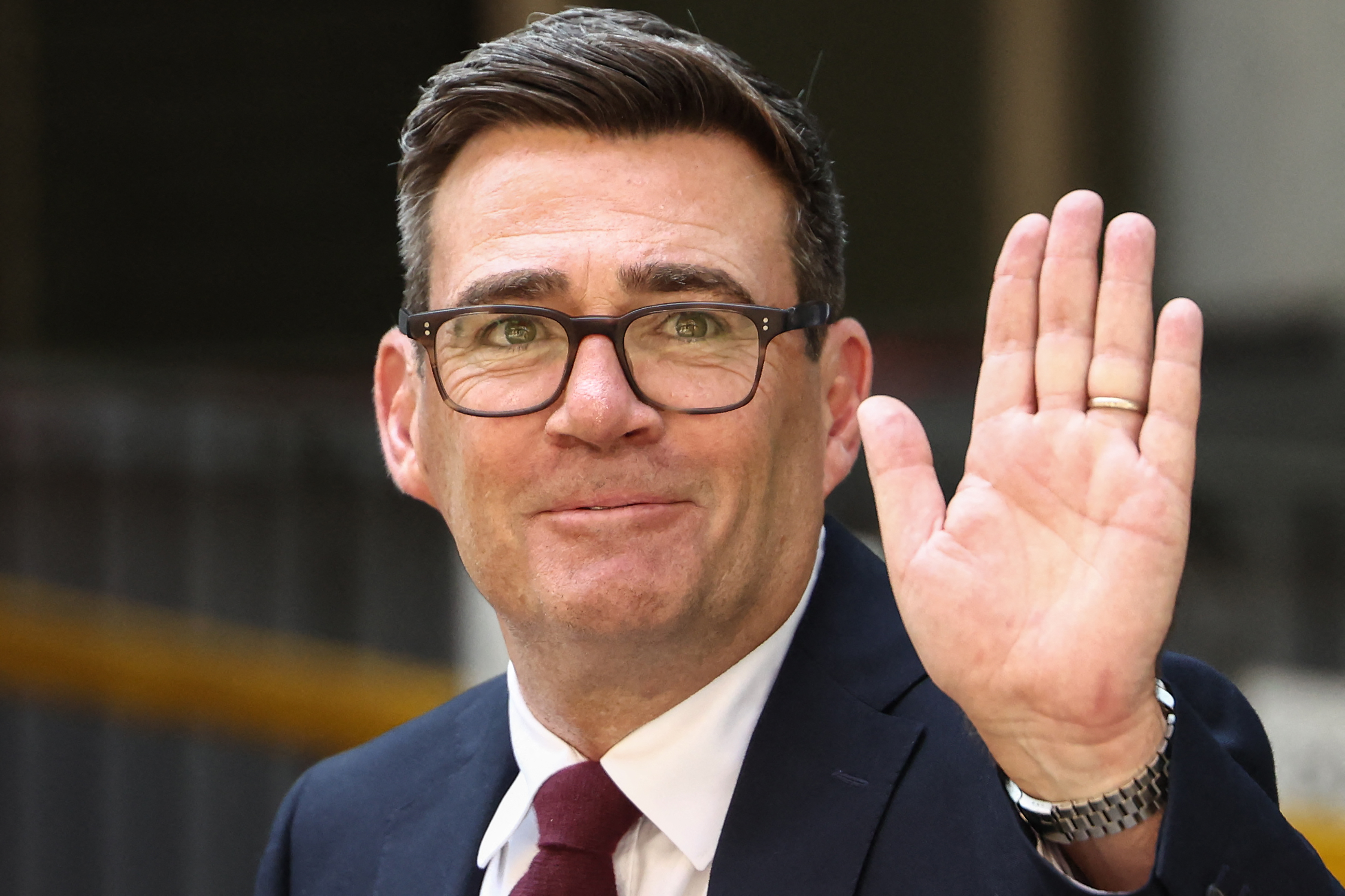 Andy Burnham waves as he leaves Labour’s 'Special Conference' where he was confirmed as the Labour Party's new leader and the country's next prime minister, in central London on July 17, 2026. (Photo by Toby Shepheard / AFP)