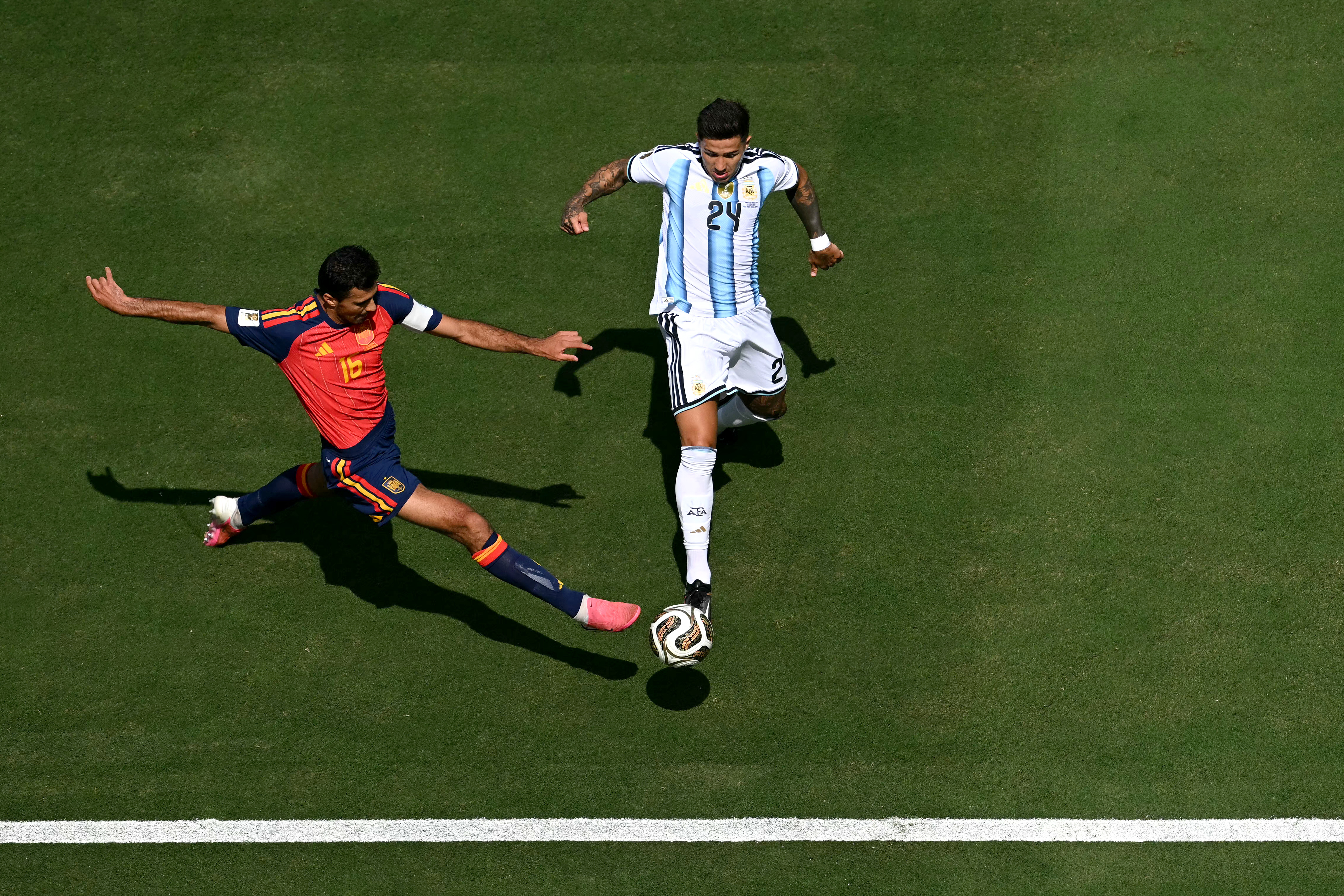 Spain's midfielder #16 Rodri and Argentina's midfielder #24 Enzo Fernandez fight for the ball during the 2026 World Cup football tournament final match between Spain and Argentina at the New York/New Jersey Stadium in East Rutherford on July 19, 2026.