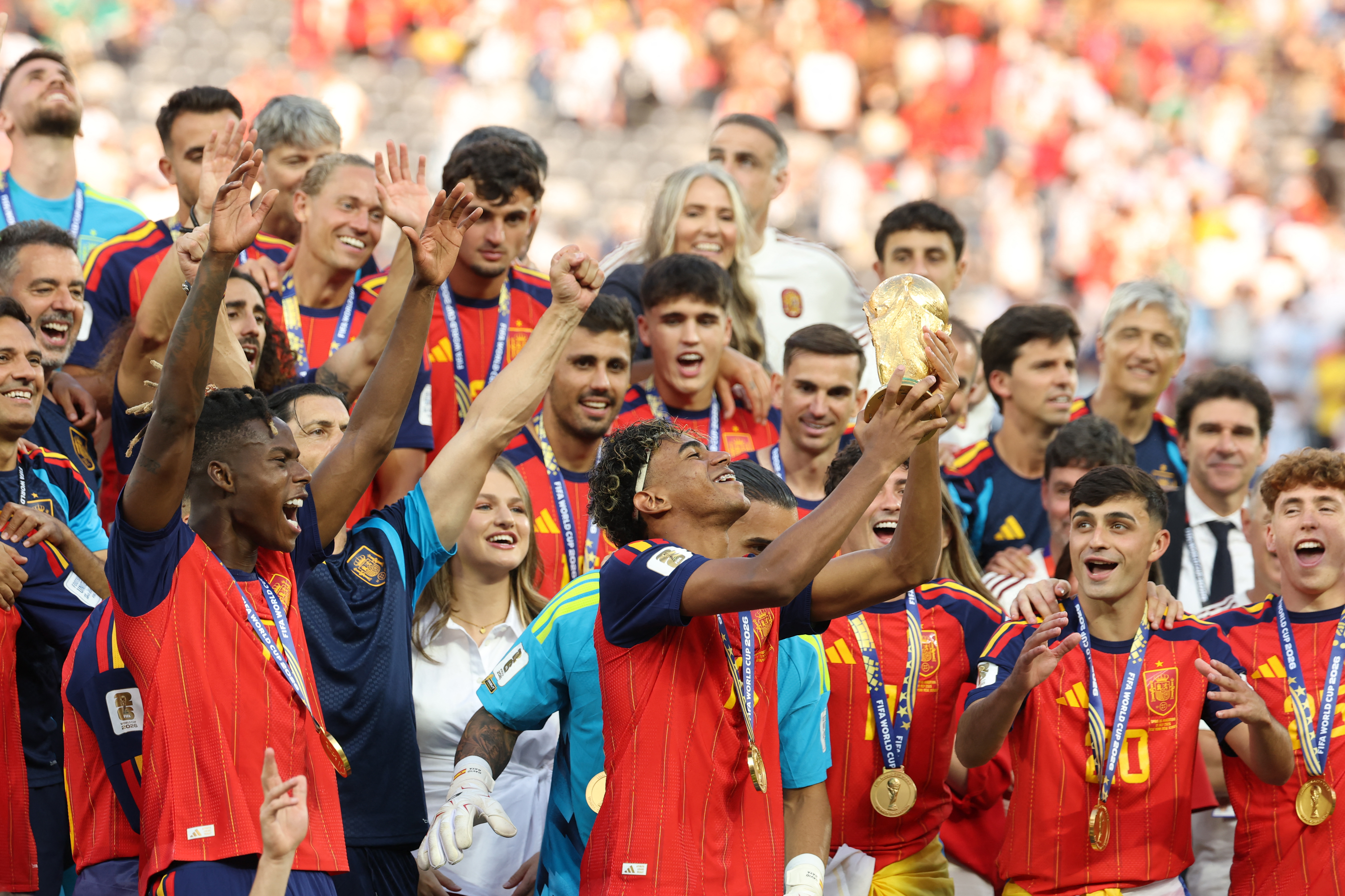 Spain's forward #19 Lamine Yamal lifts the trophy with his teammates after winning the 2026 World Cup football tournament final match between Spain and Argentina at the New York/New Jersey Stadium in East Rutherford on July 19, 2026.
