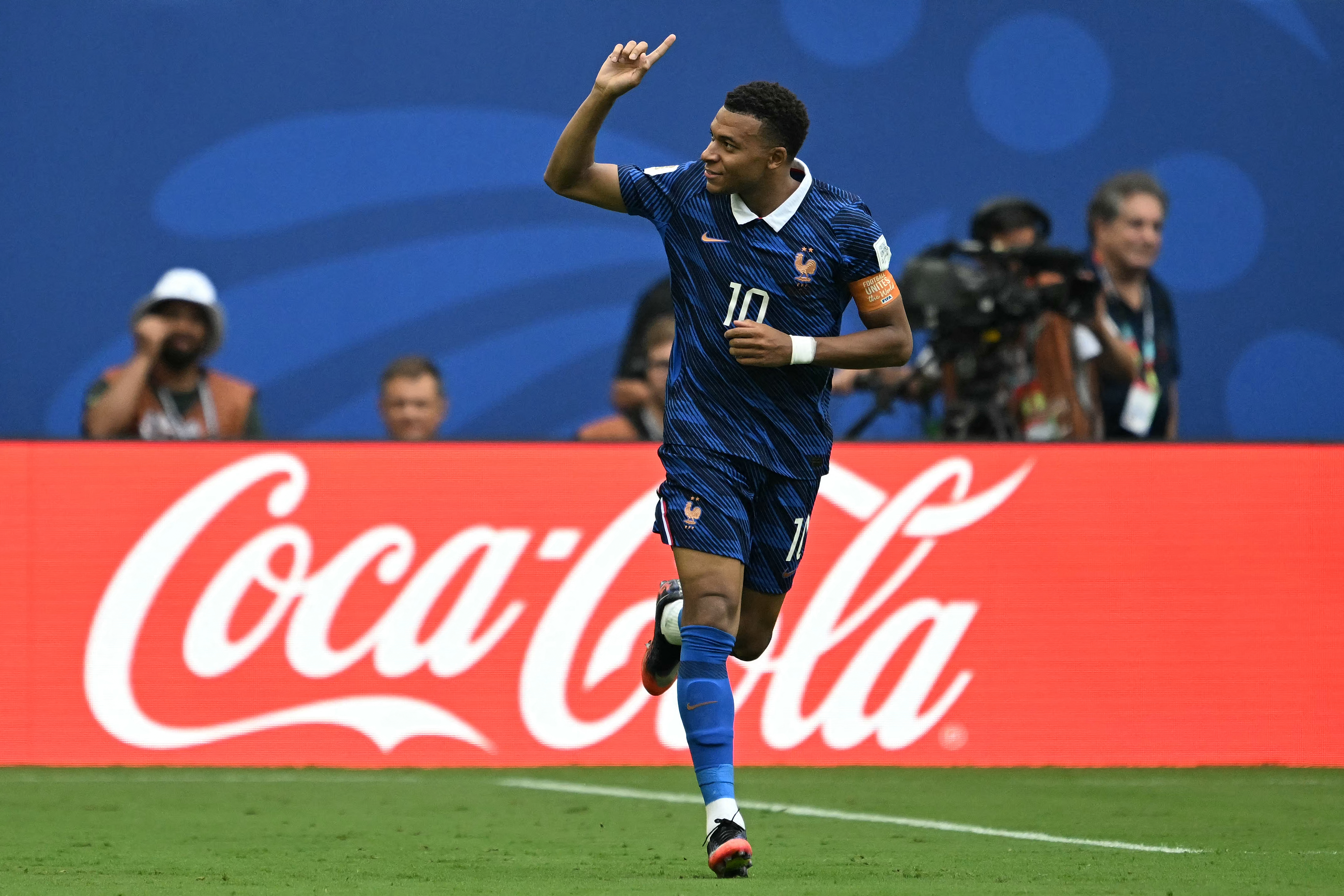 France's forward #10 Kylian Mbappe celebrates scoring his team's first goal during the 2026 World Cup football tournament third-place match between France and England at the Miami Stadium in Miami on July 18, 2026.
