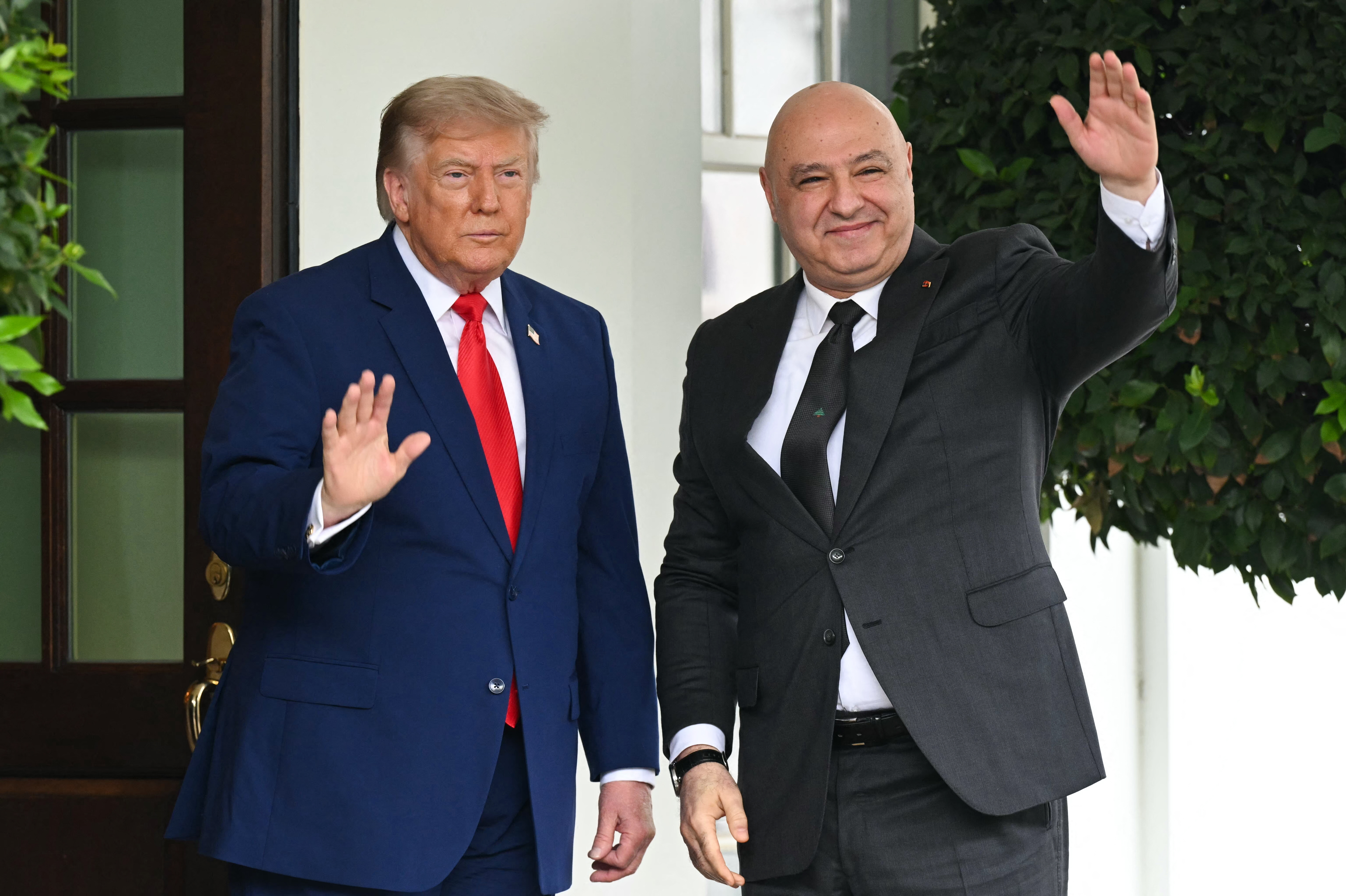 US President Donald Trump greets Lebanese President Joseph Aoun at the entrance to the West Wing of the White House in Washington, DC, on July 21, 2026. (Photo by SAUL LOEB / AFP)