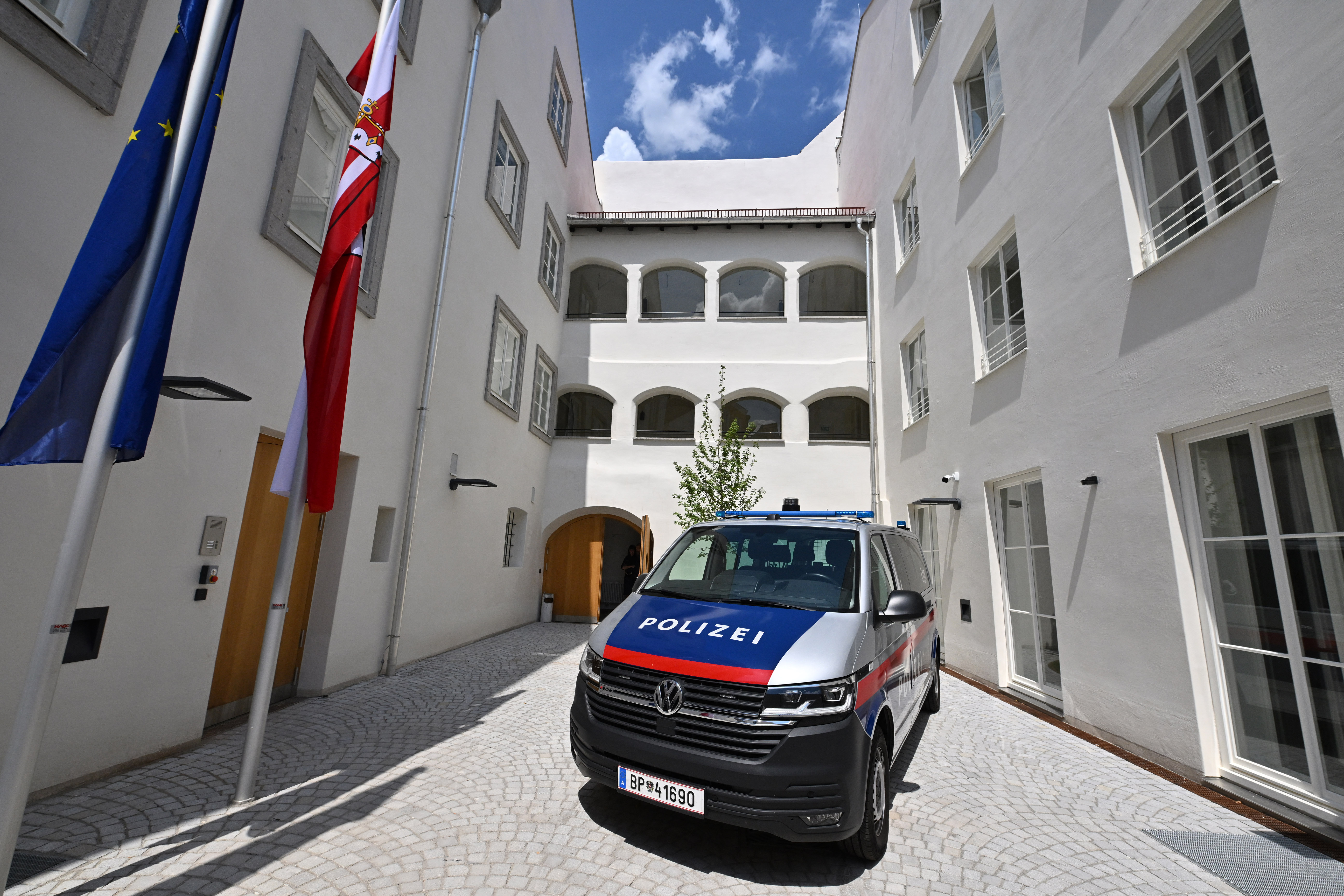 Picture taken on July 16, 2026 shows a police car standing in a courtyard of the birth house of former German dictator Adolf Hitler that is turned into a police station, in Braunau am Inn, Austria.