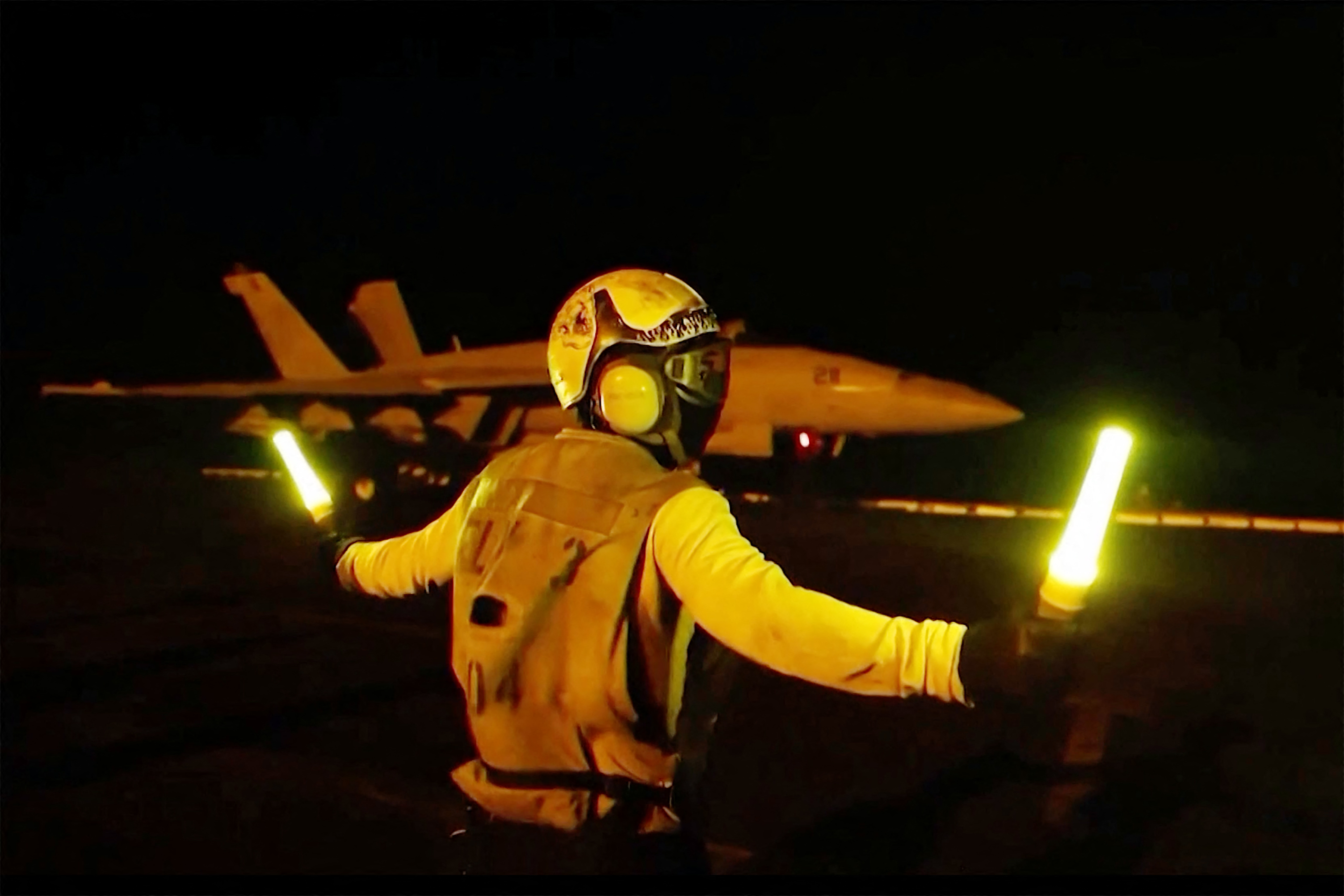 This screen grab made on July 22, 2026 from handout video footage released by the US Central Command (CENTCOM) on July 21, 2026 shows US forces launching what the military says are precision strikes targeting Iranian military capabilities for the eleventh consecutive night.