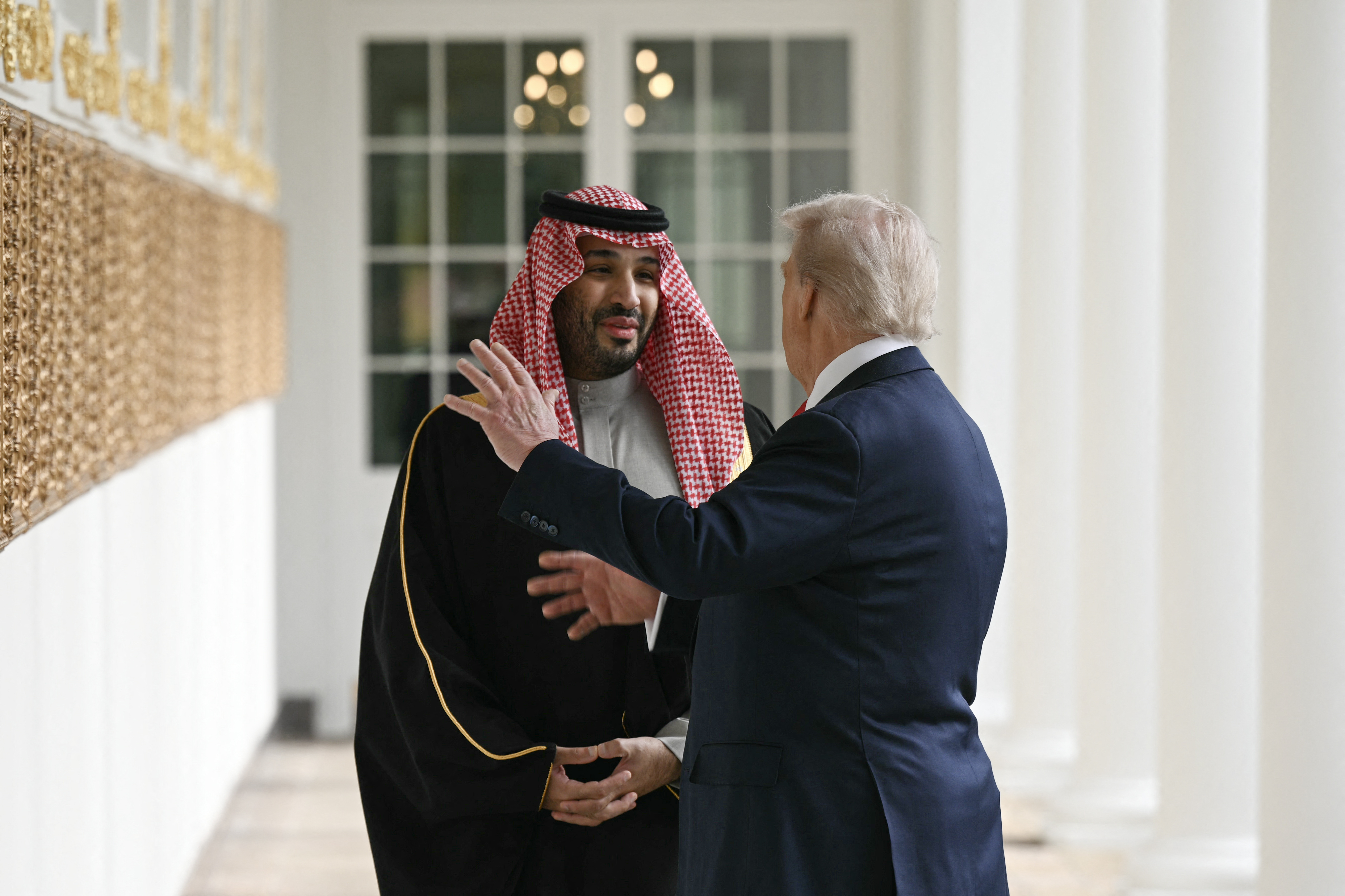 Two men stand together