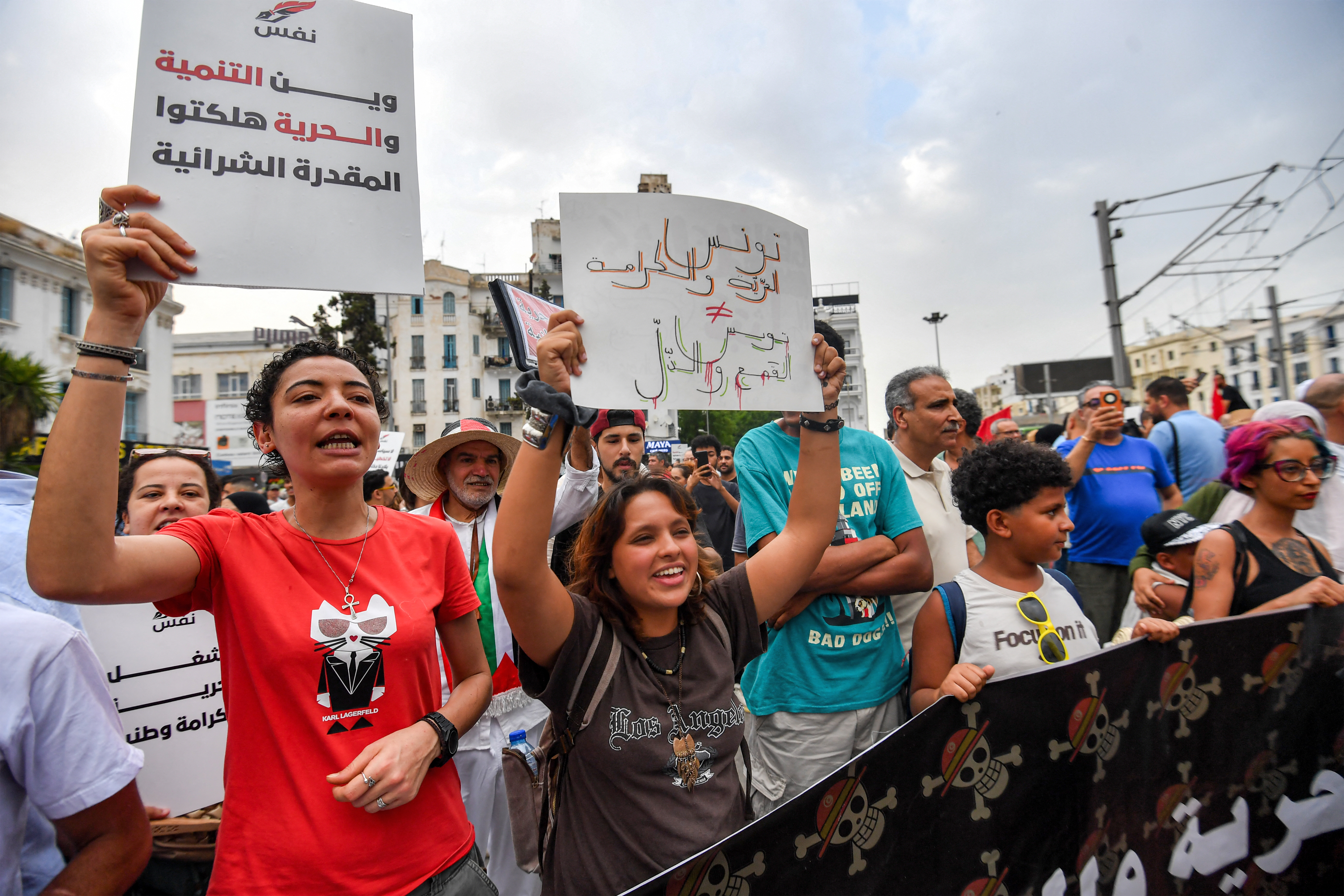 People gather to protest Tunisia's President Kais Saied during a demonstration marking five years since his suspension of parliament and assumption of emergency powers, in Tunis on July 25, 2026.